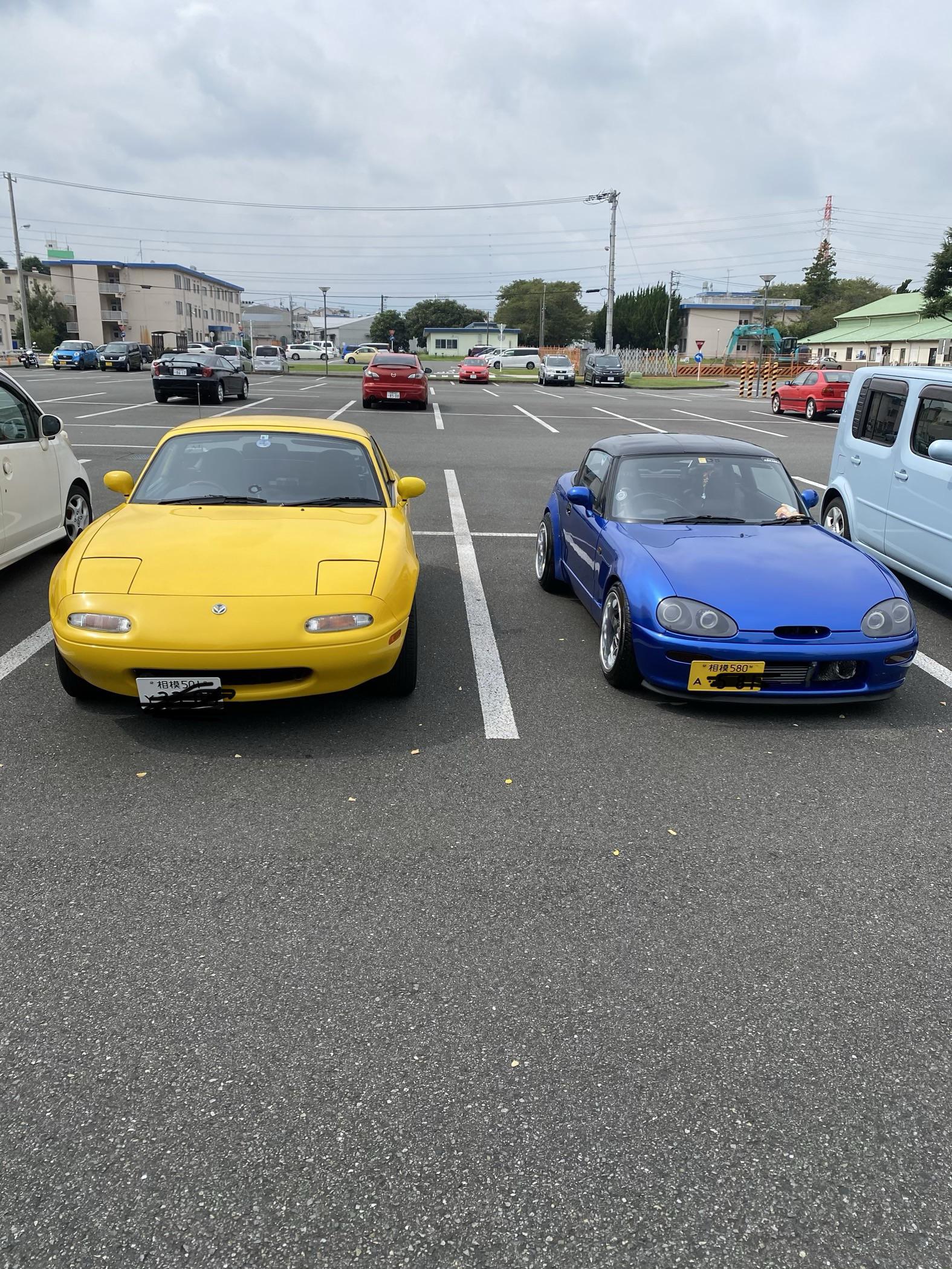 My 90 Eunos Roadster and the cheeky Suzuki cappuccino that parked next