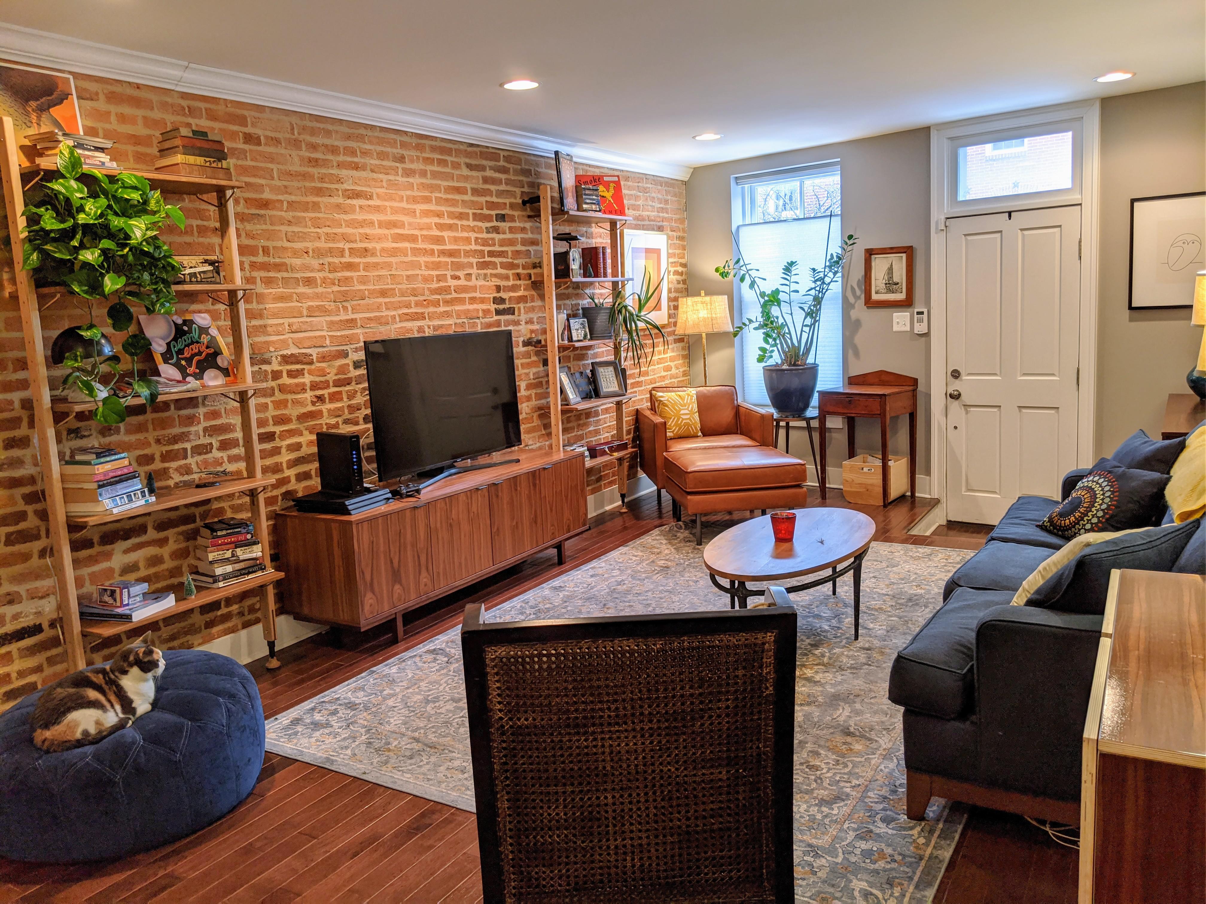 Living room in a renovated rowhouse originally built in 1852 (Baltimore
