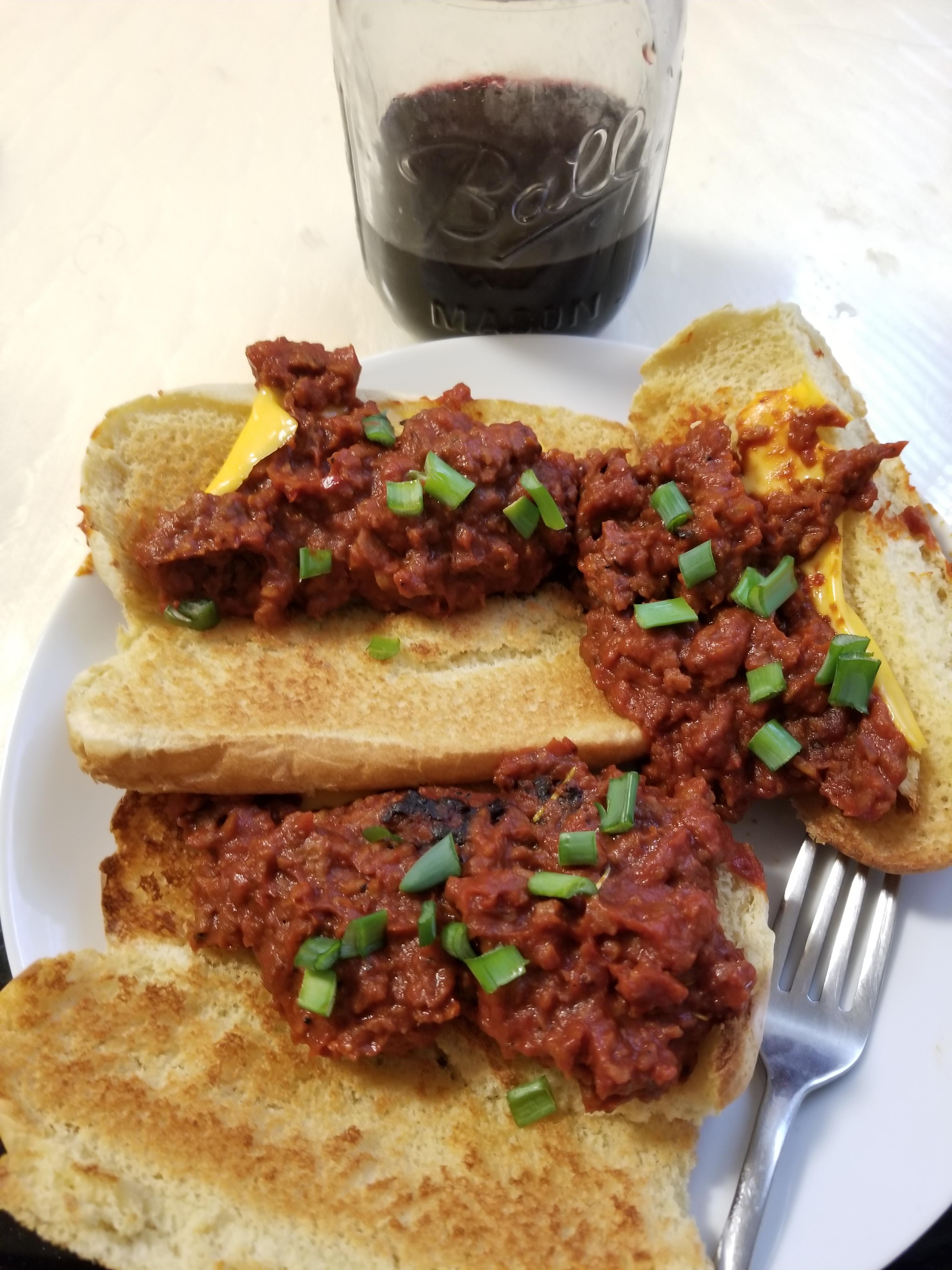 Sloppy Joe's, fake meat crumbles, american cheese on hot dog buns
