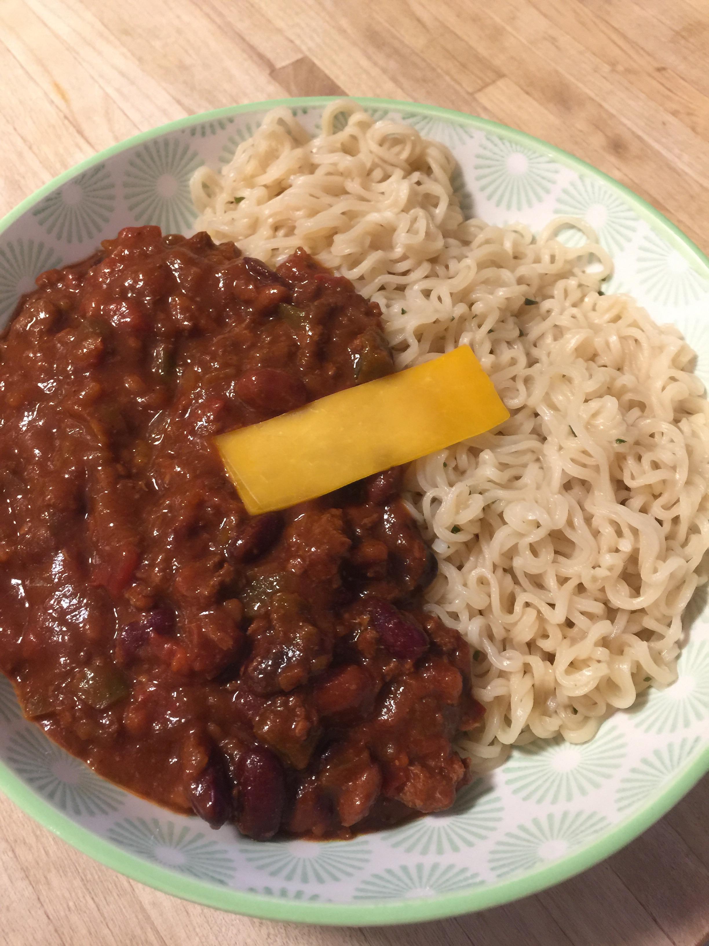Drained ramen with canned chili. The cheese makes it healthy r