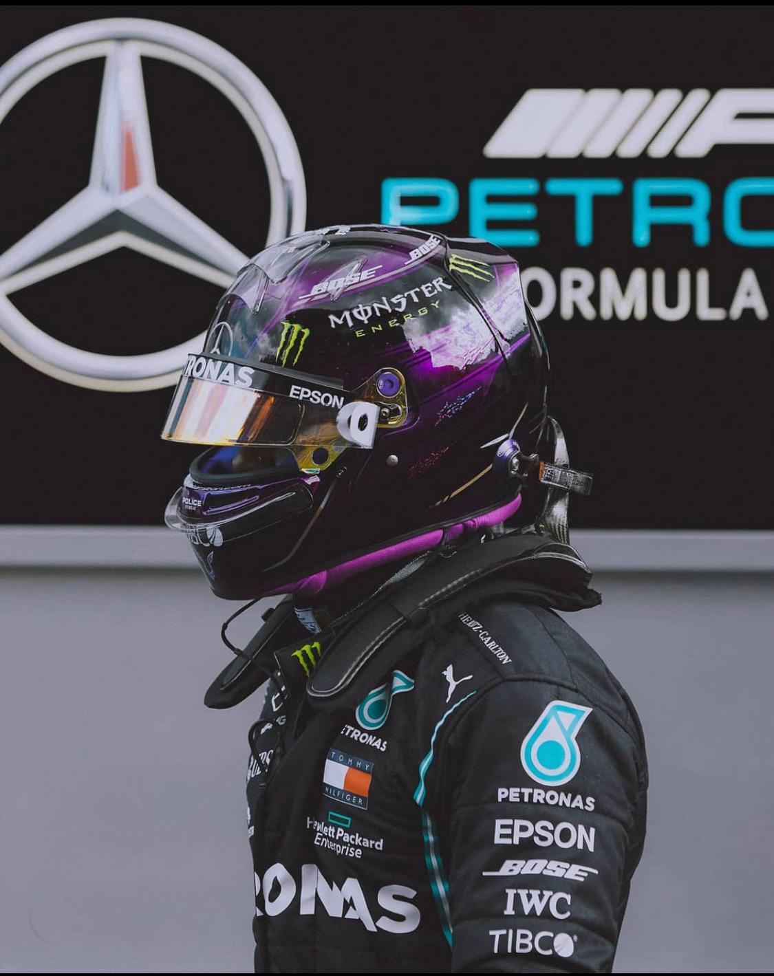 Shot of Lewis with the new helmet design and new race suit r/formula1