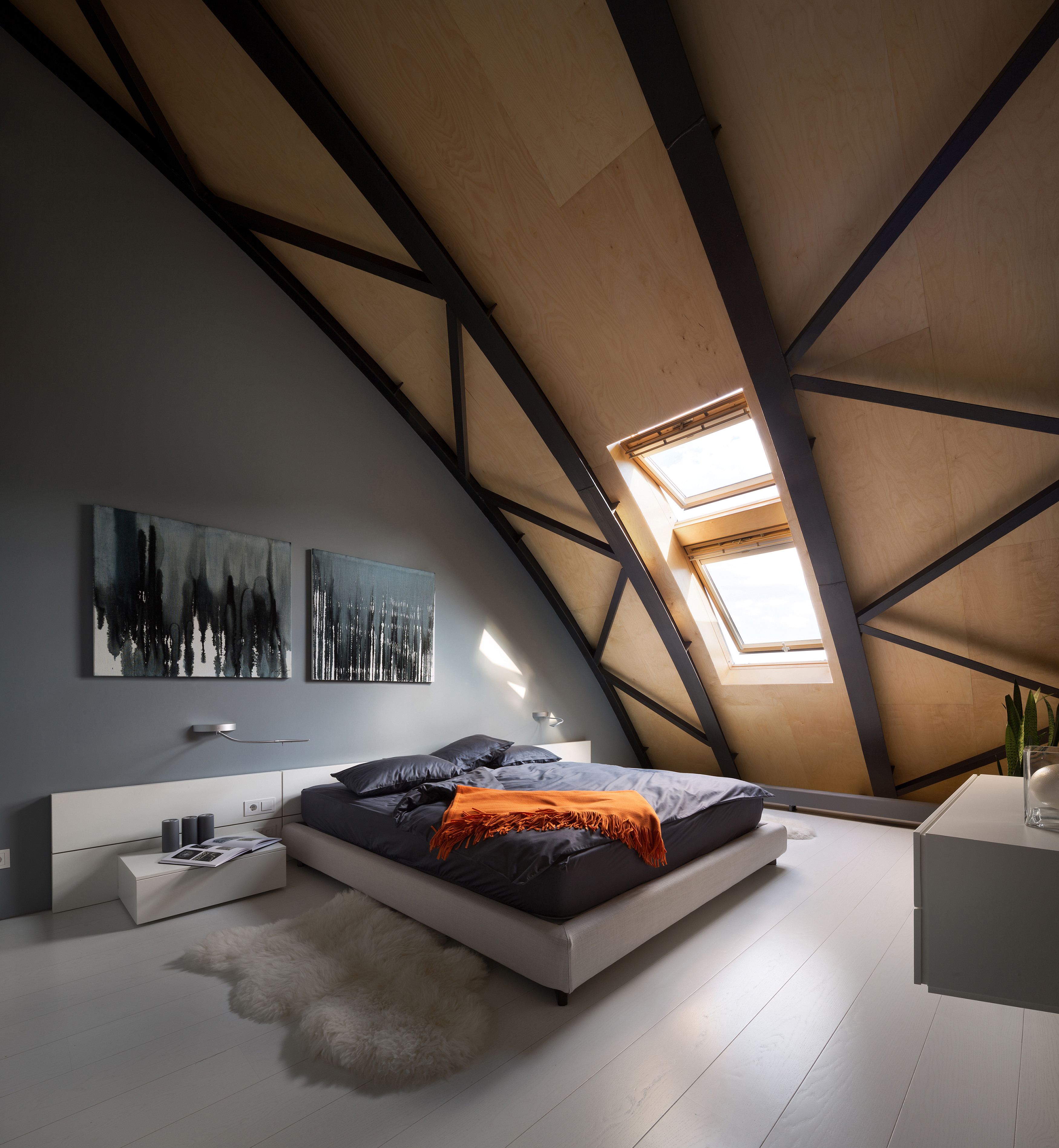 Bedroom in a modern loft apartment, formerly a commercial building
