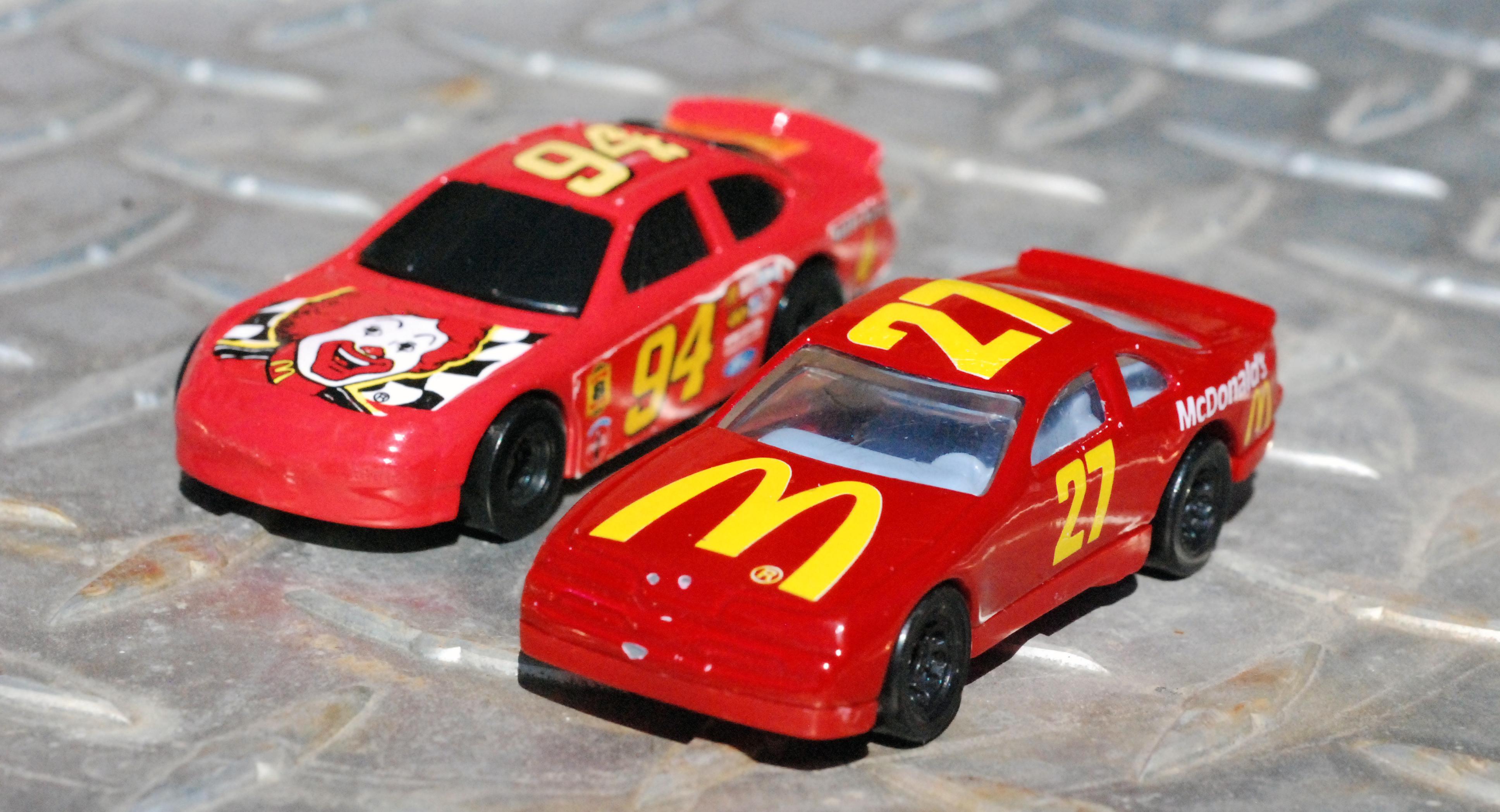 McDonald's Happy Meal toys HotWheels stock cars. My wife's 1998 (L) and