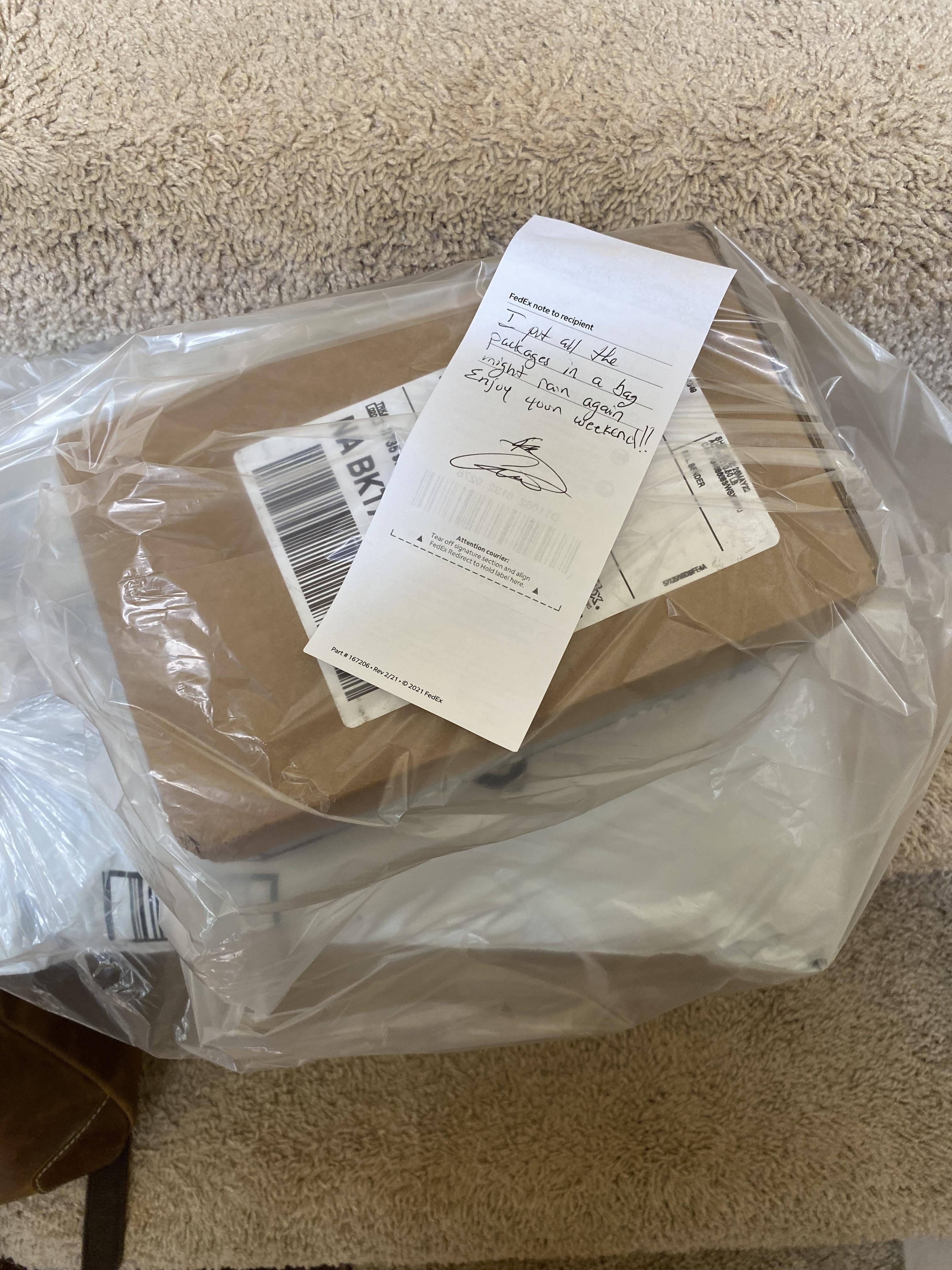 A FedEx driver dropped off a package and, due to the rain, put all of
