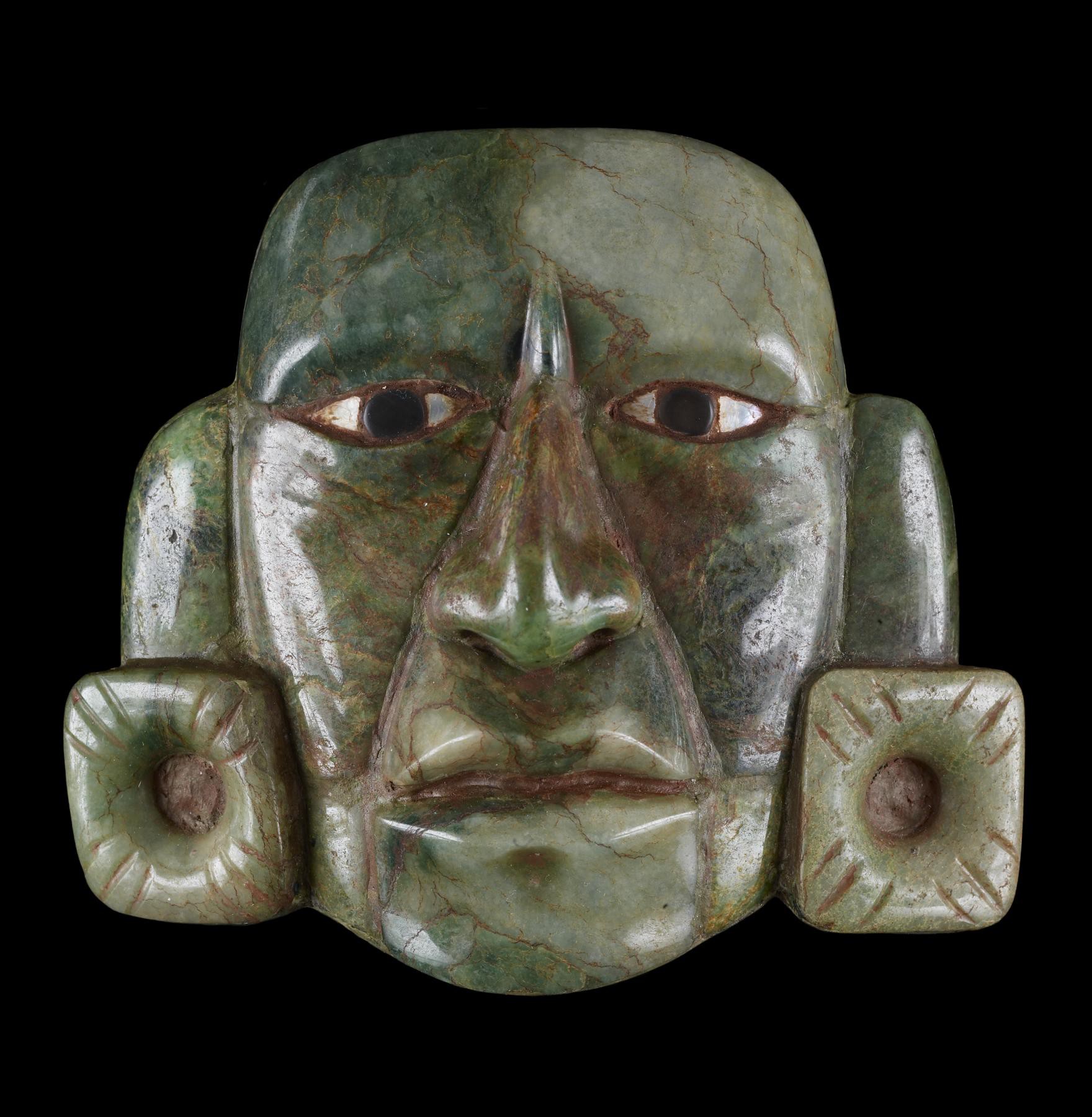 Jade mask with shell and obsidian eyes. Guatemala, Maya civilization