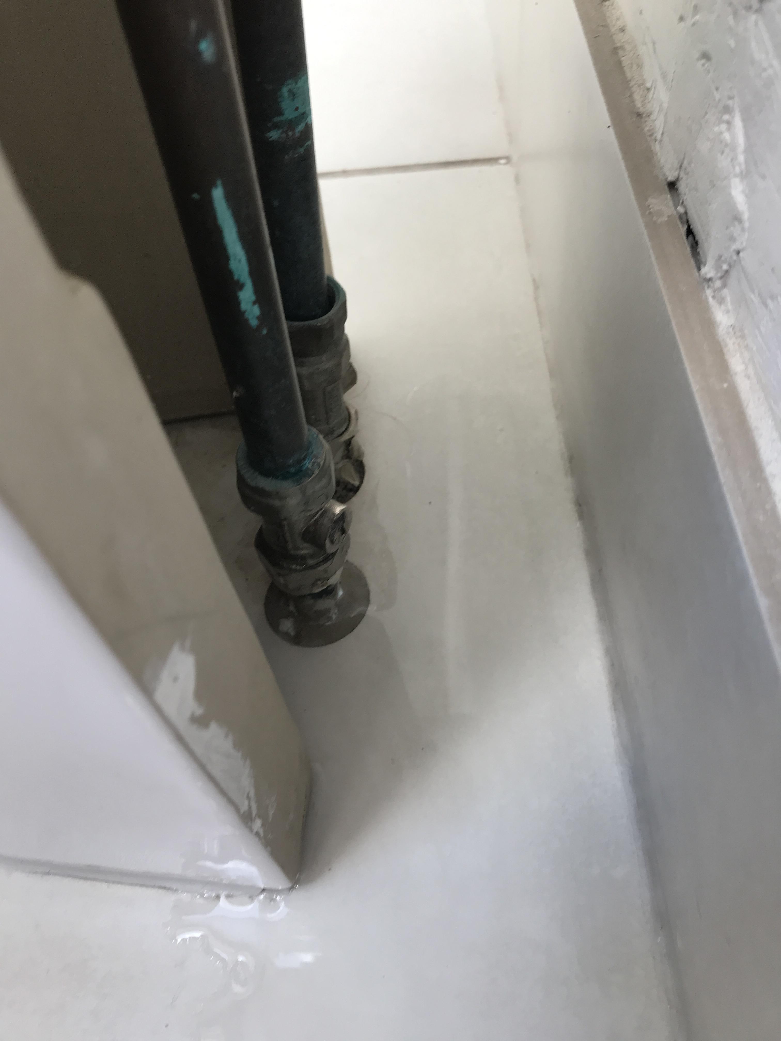 water keeps coming through floor behind sink is it ok to block it off