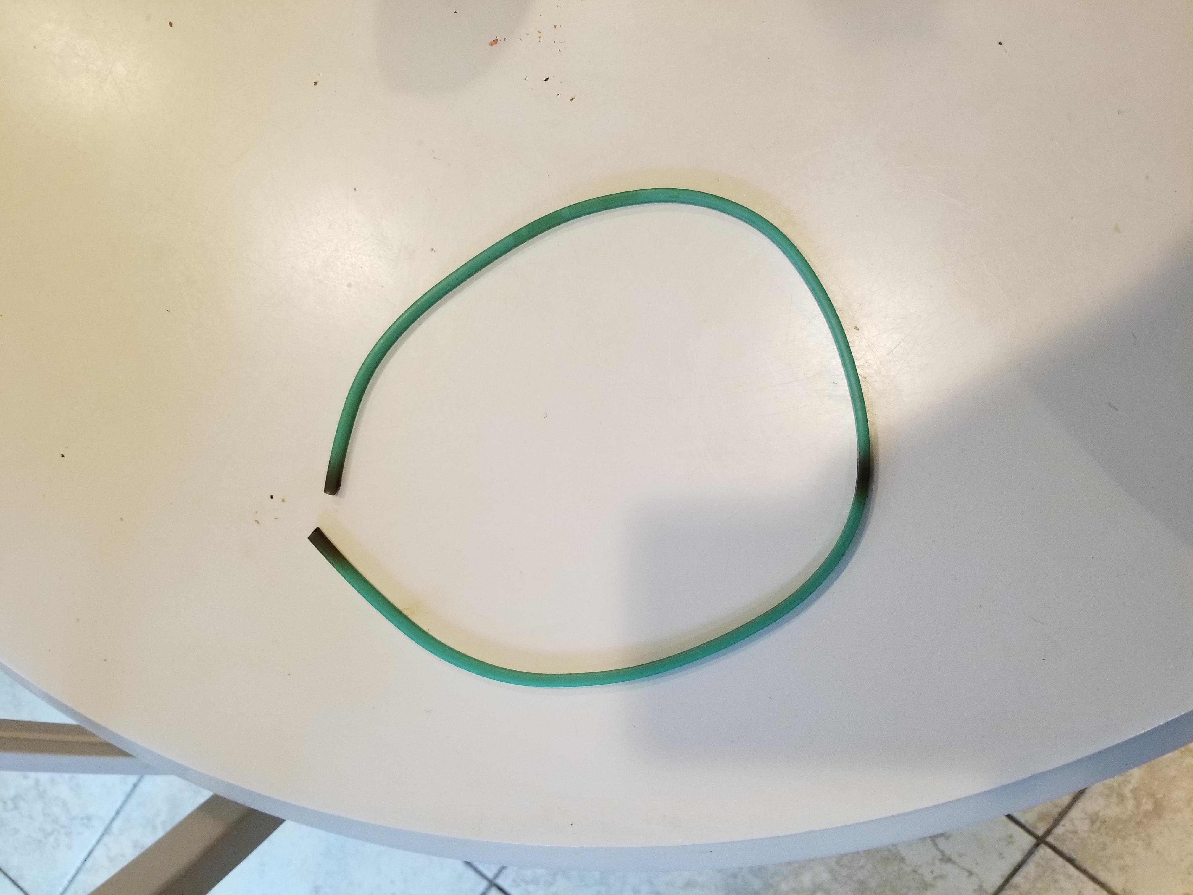Green ring (24" in length) found in bottom of my Kenmore Dishwasher