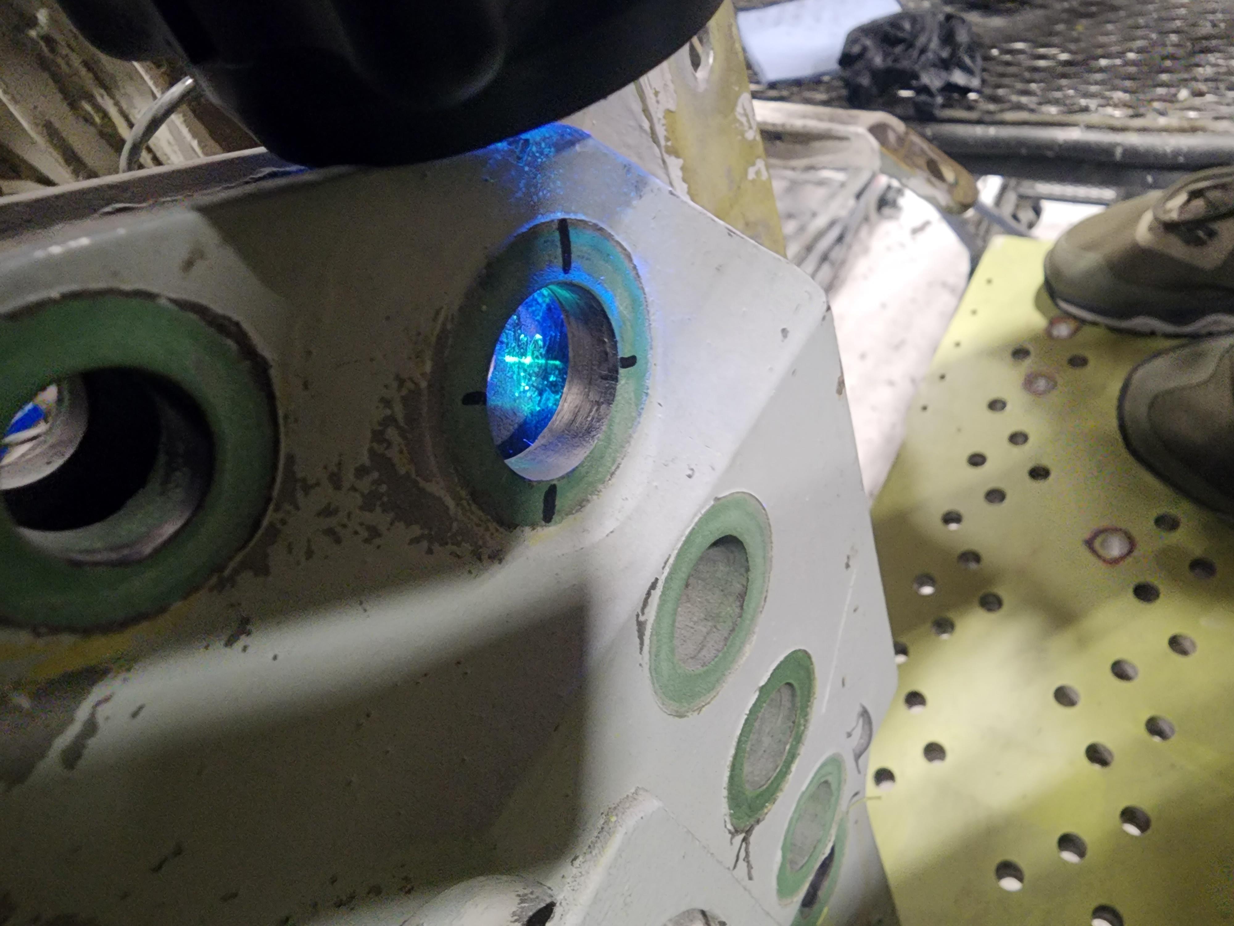 Found a crack in a steel Main Landing Gear Trunnion Fitting, then Fpi'd