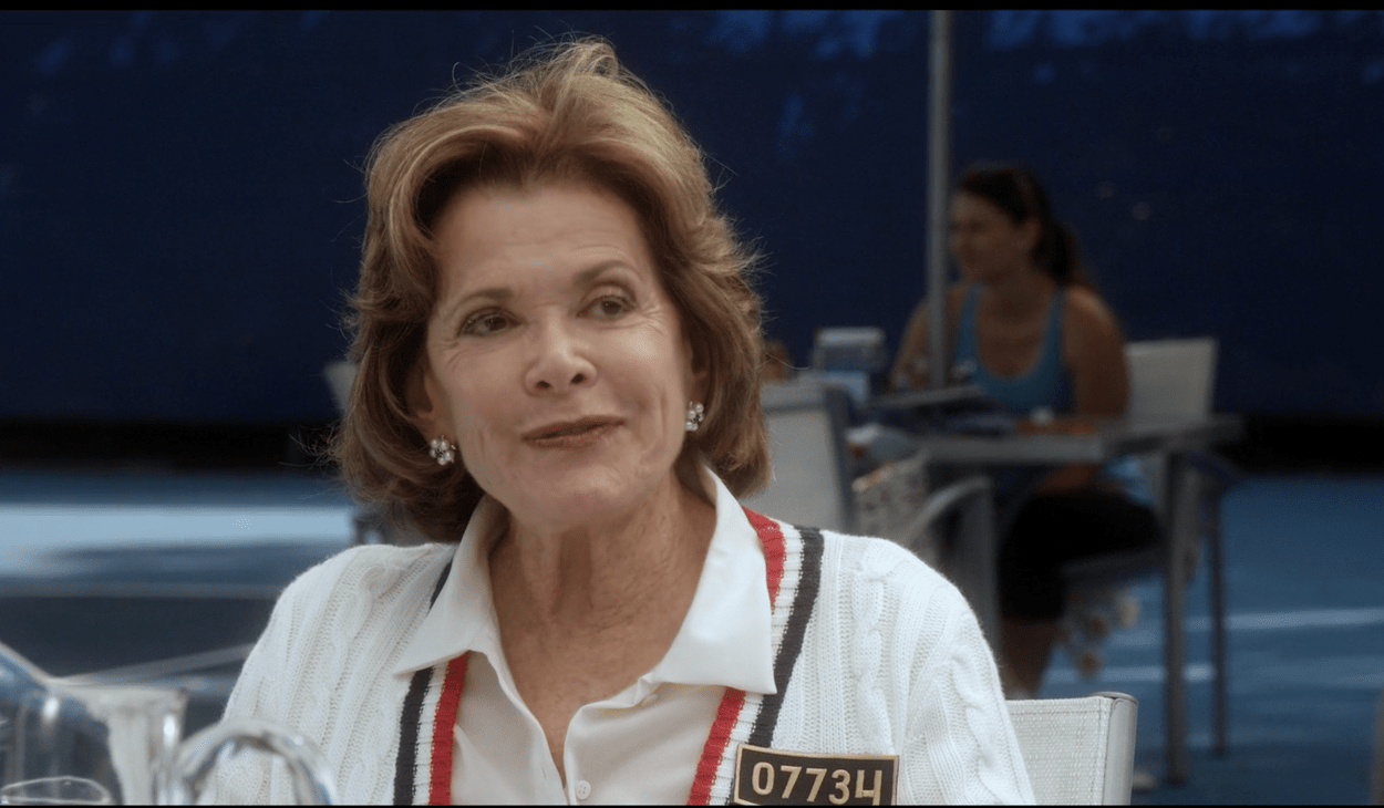 In Arrested Development Season 4, Lucille Bluth's ID tag is HELLO