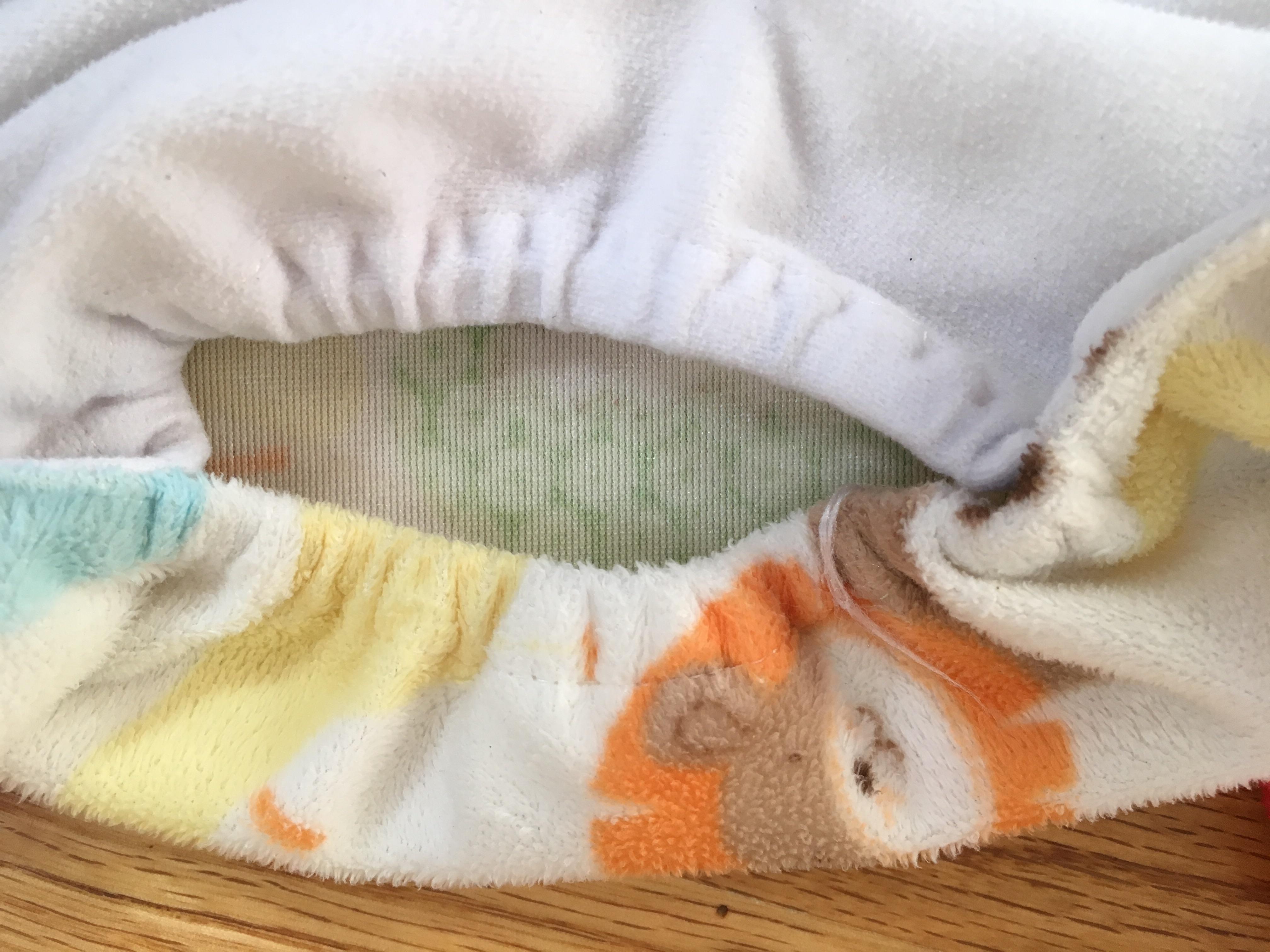 Pocket with soft “fleecelike” exterior (PUL inside)... Why aren’t more