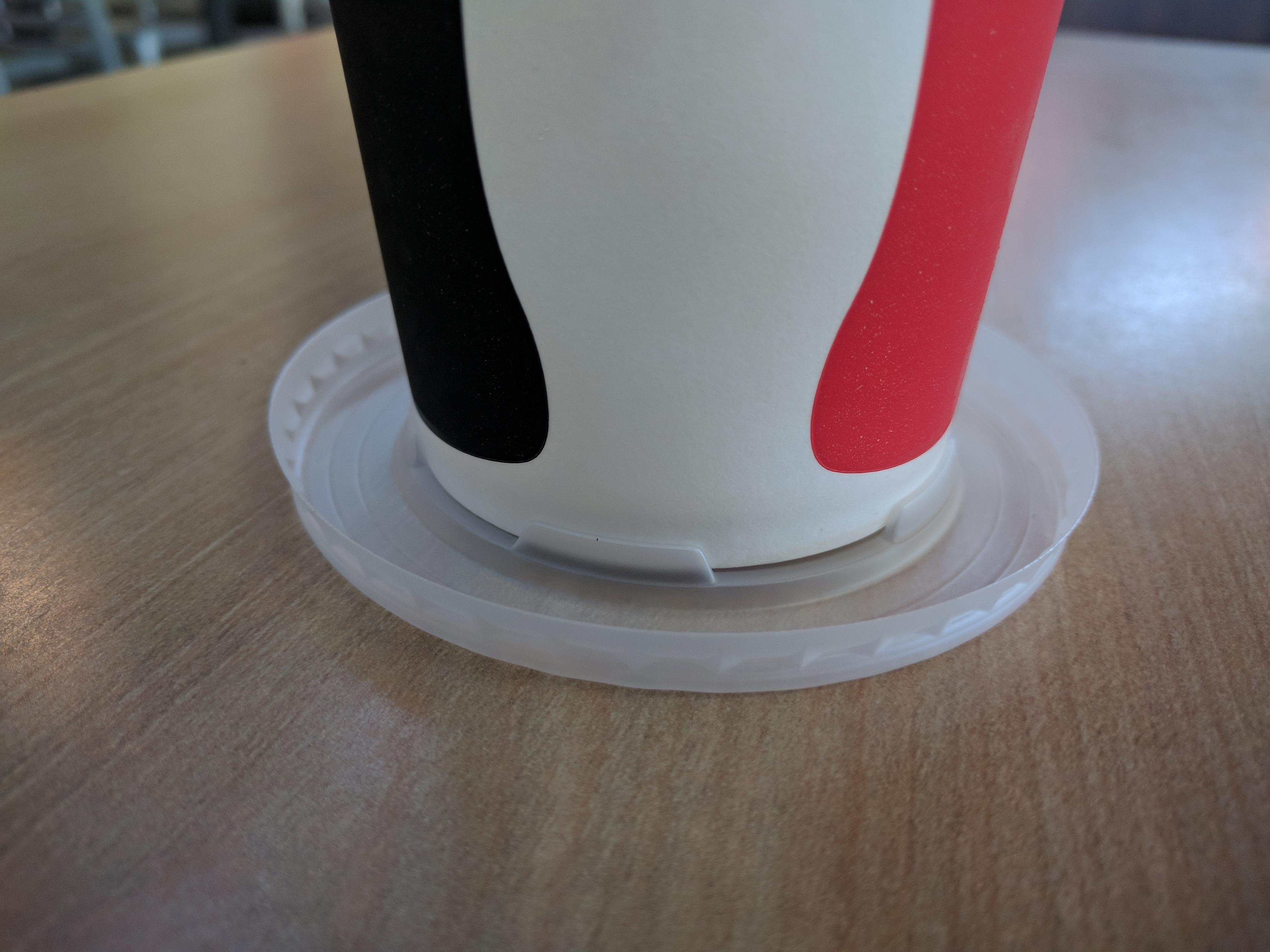 This cup lid, when flipped upside down, fits perfectly as a coaster