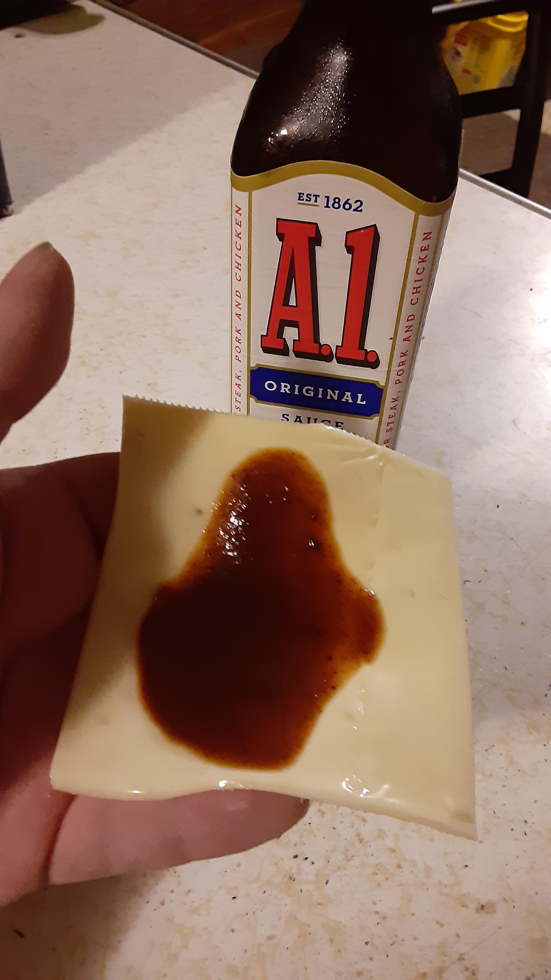 High, hungry, and eating pepperjack cheese slices covered in A1 sauce