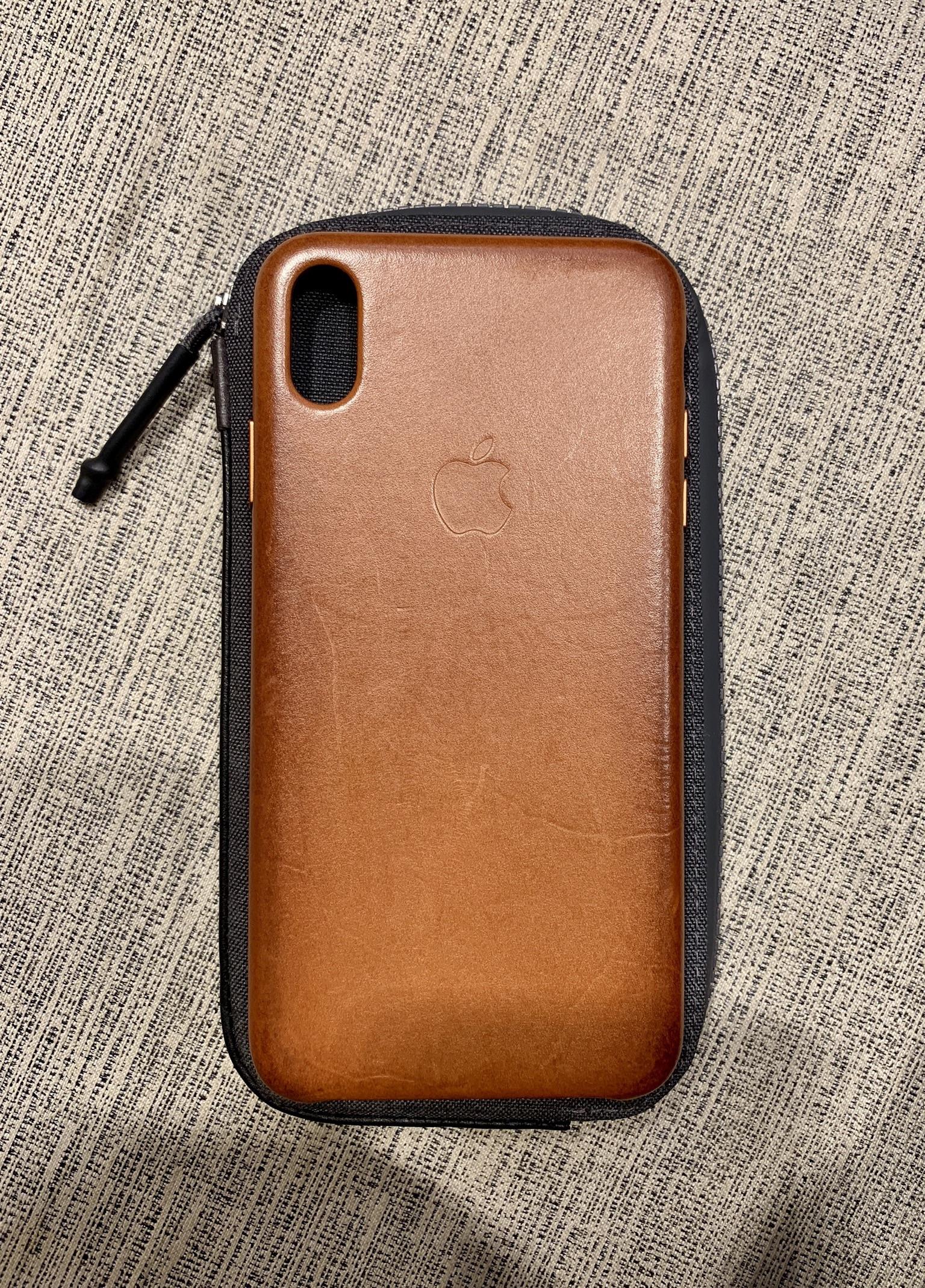 After two weeks of use, the Apple Leather Saddle Brown case. I can’t