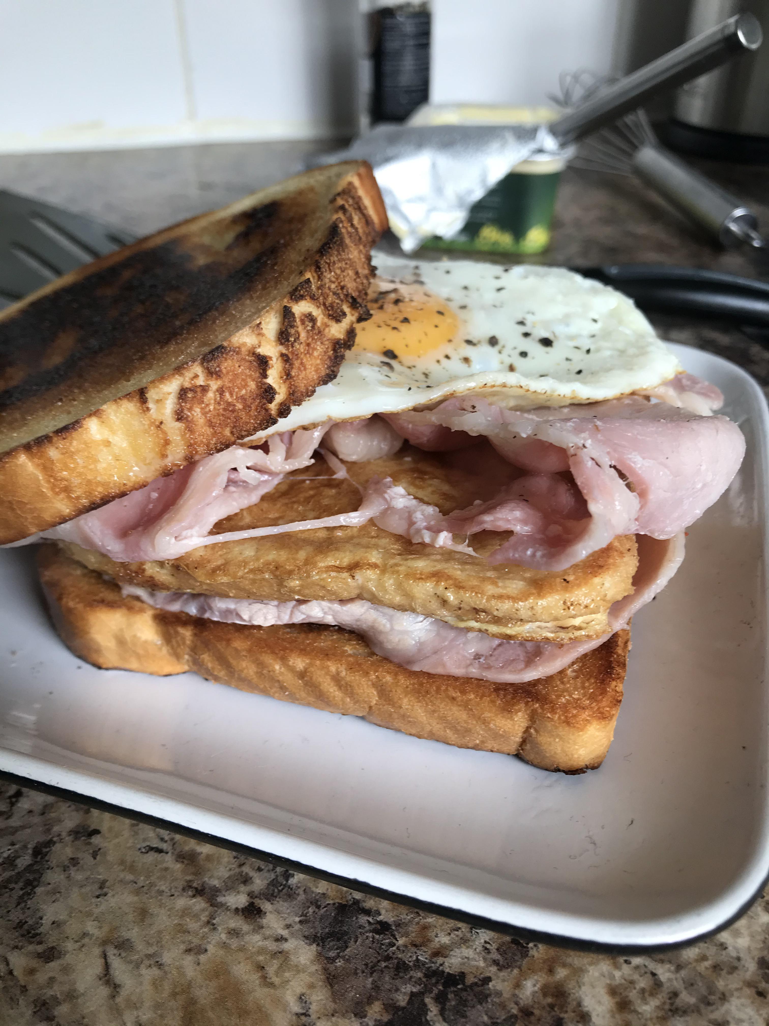 Brunch Butty Fried egg smoked bacon eggy bread in the middle and bread