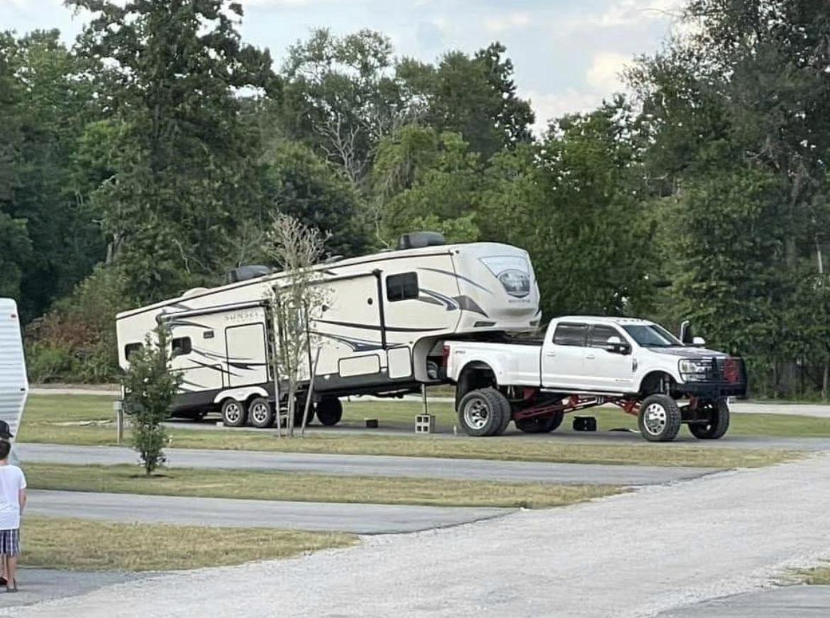 Lifted Truck Towing 5th Wheel