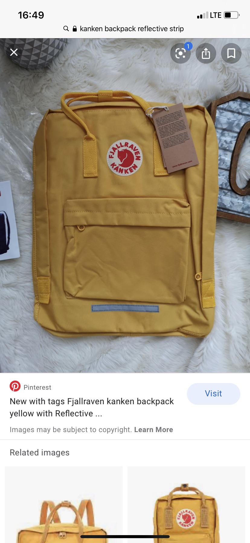 Is this kind of backpack fake? I’ve never seeing a reflector in the