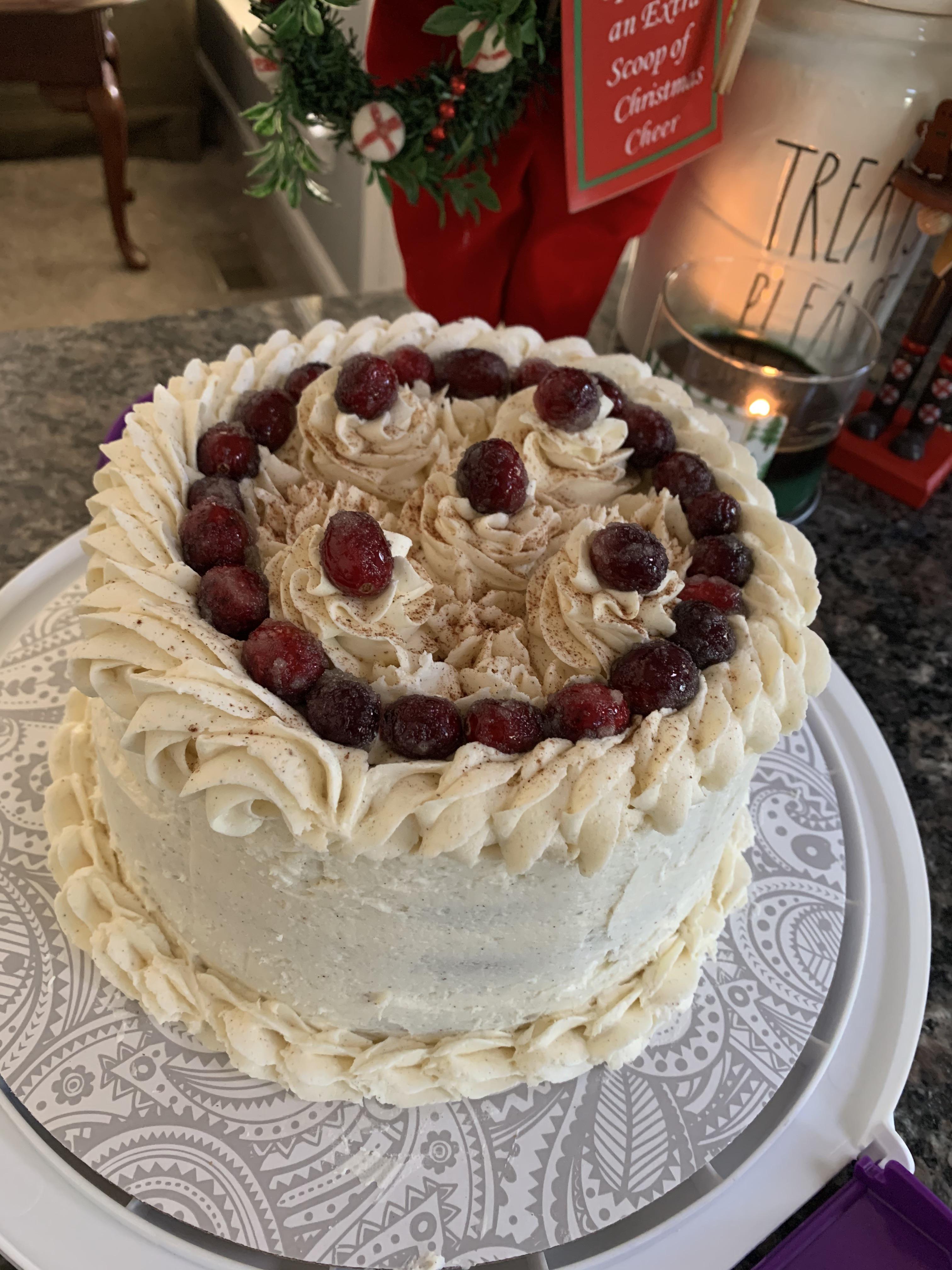 Eggnog cake topped with sugared cranberries r/Cakes