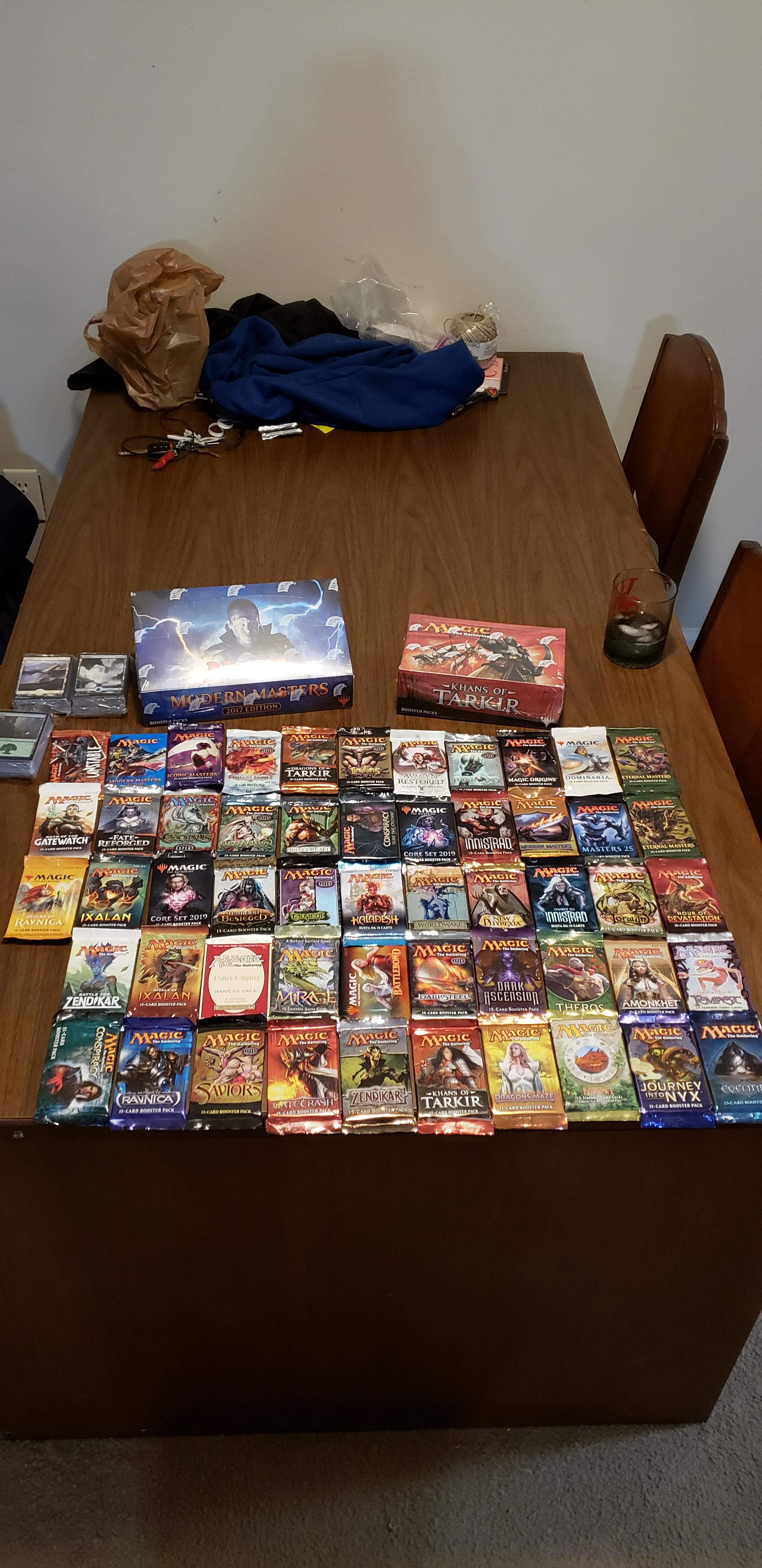 My unopened MTG booster pack collection. r/tcgcollecting