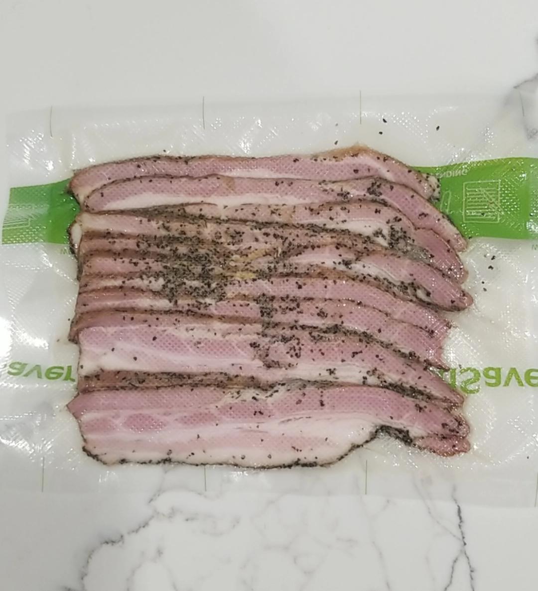 How long can my homemade bacon last in the fridge? Should I put some of