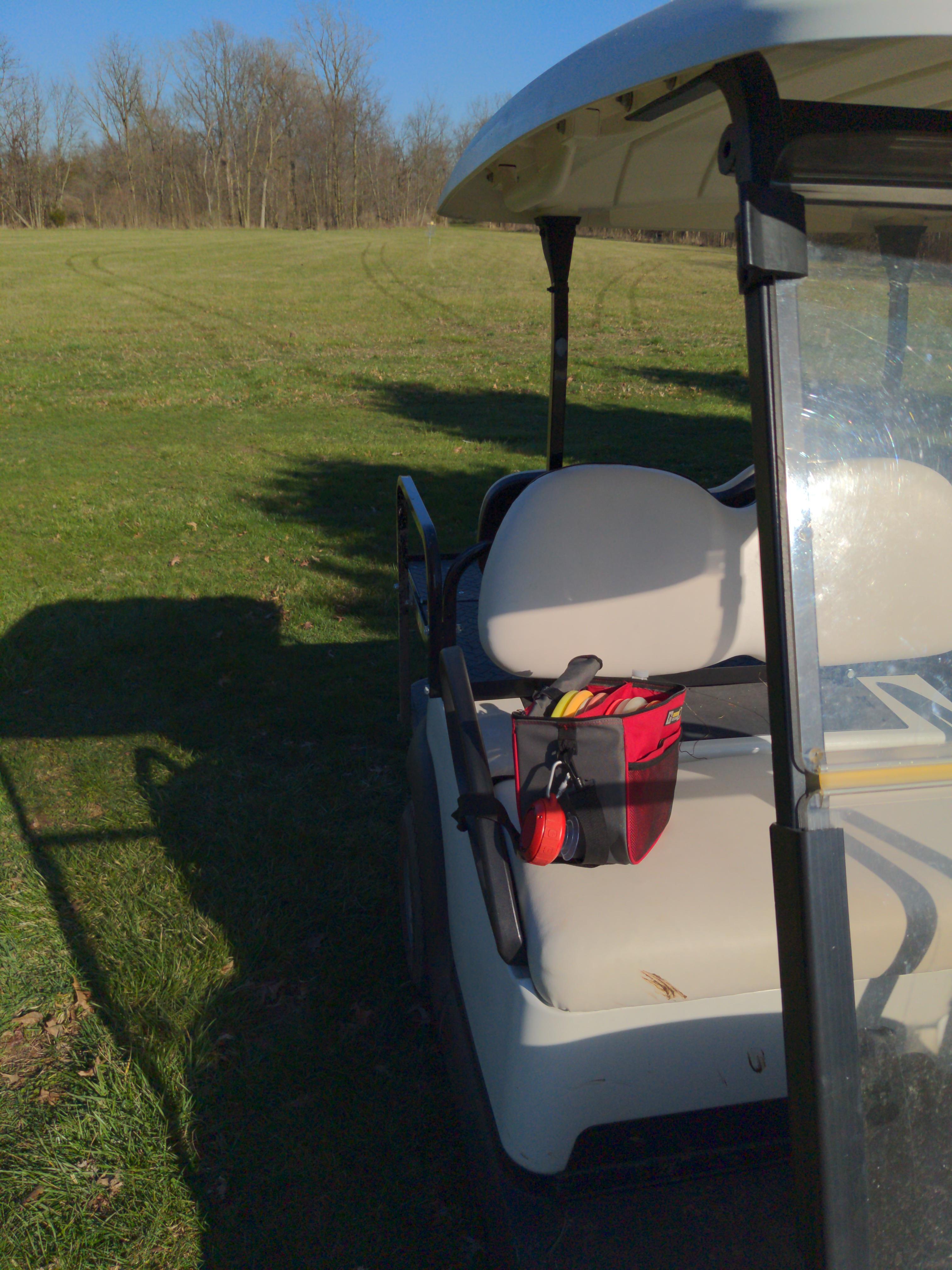 The golf cart makes field work feel less like playing fetch with