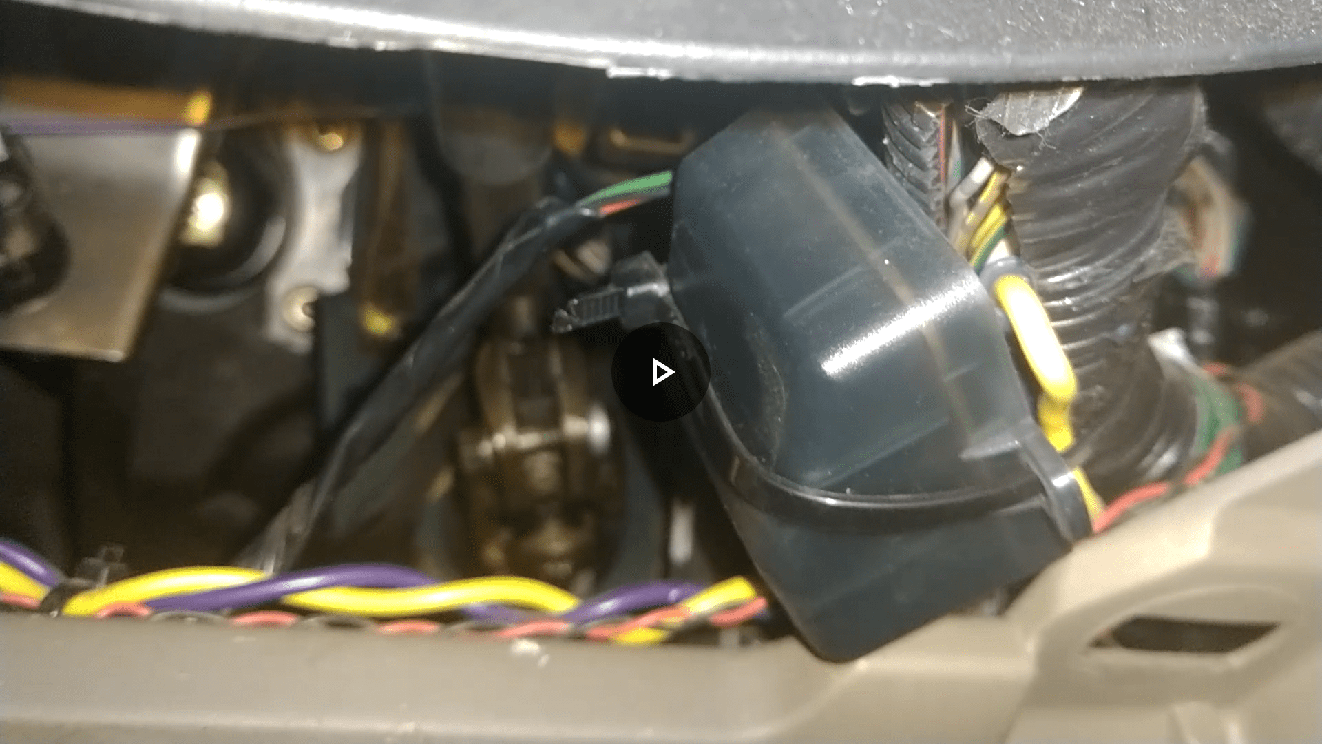 WTF is this black box under the steering wheel?.FYI Its not a video