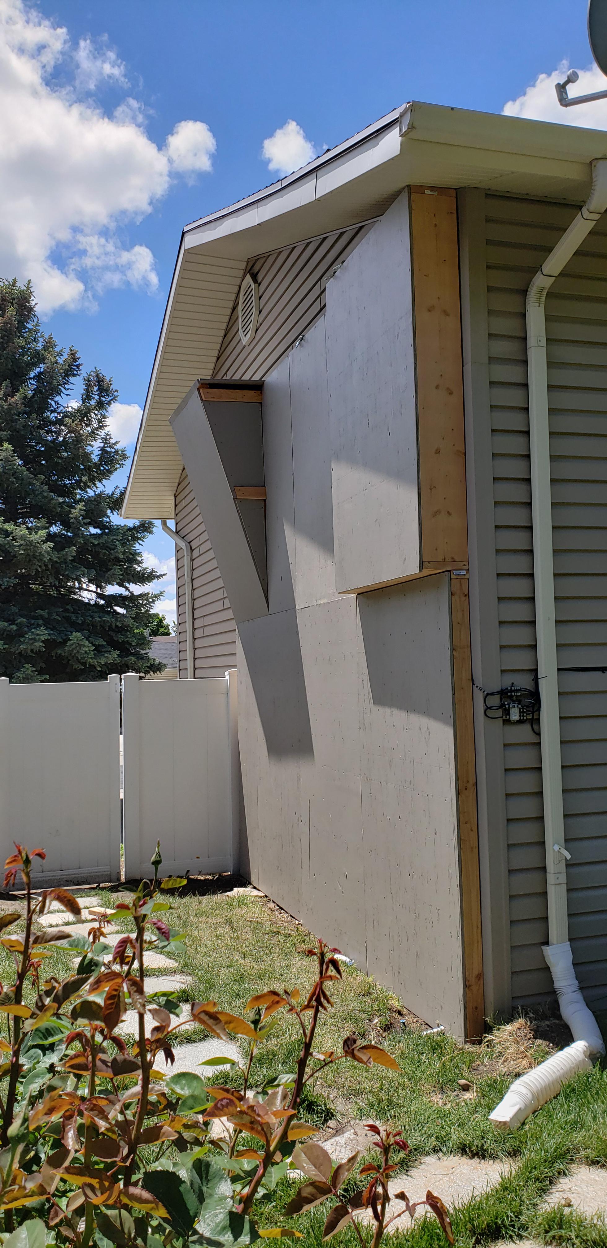 Finished the frame and plywood for my climbing wall on my house. Now