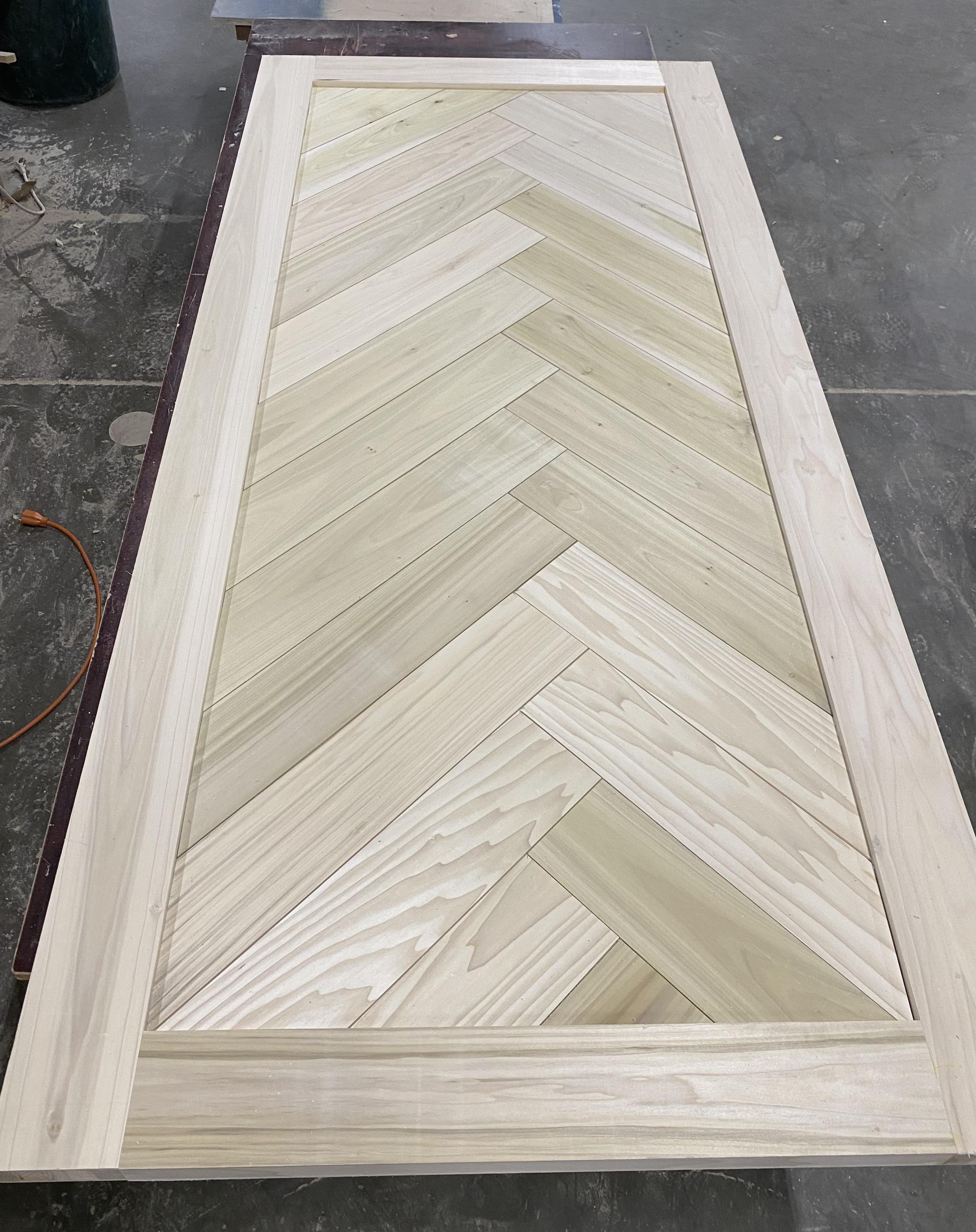 Any love for my herringbone poplar barn door? It still needs a proper