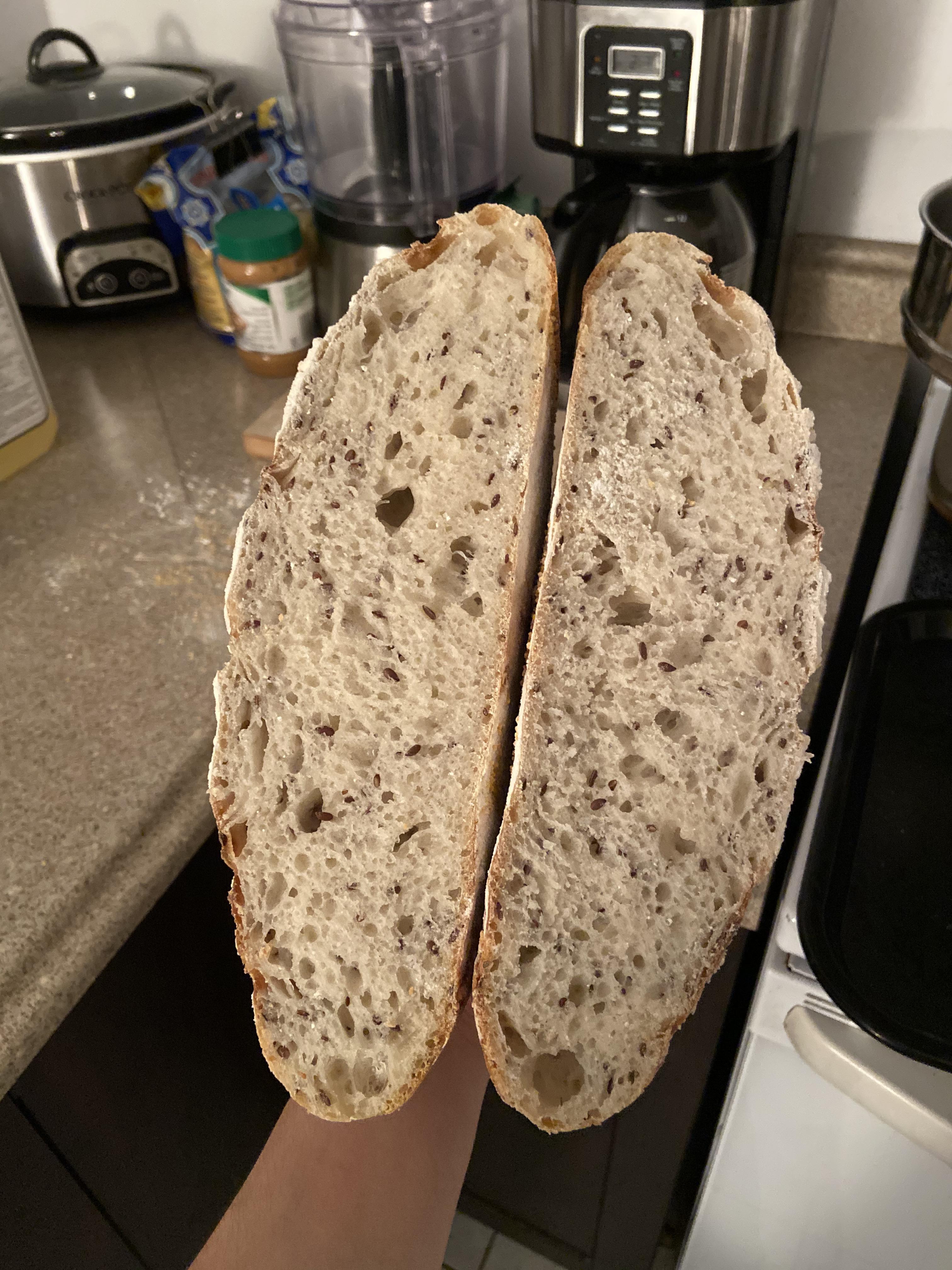 So happy with the crumb on this flax seed loaf (fourth bake) r/Sourdough
