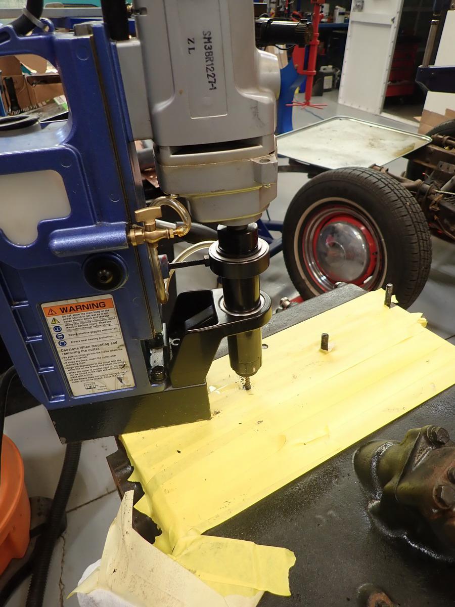 Broke two exhaust manifold studs trying to remove them. Successfully