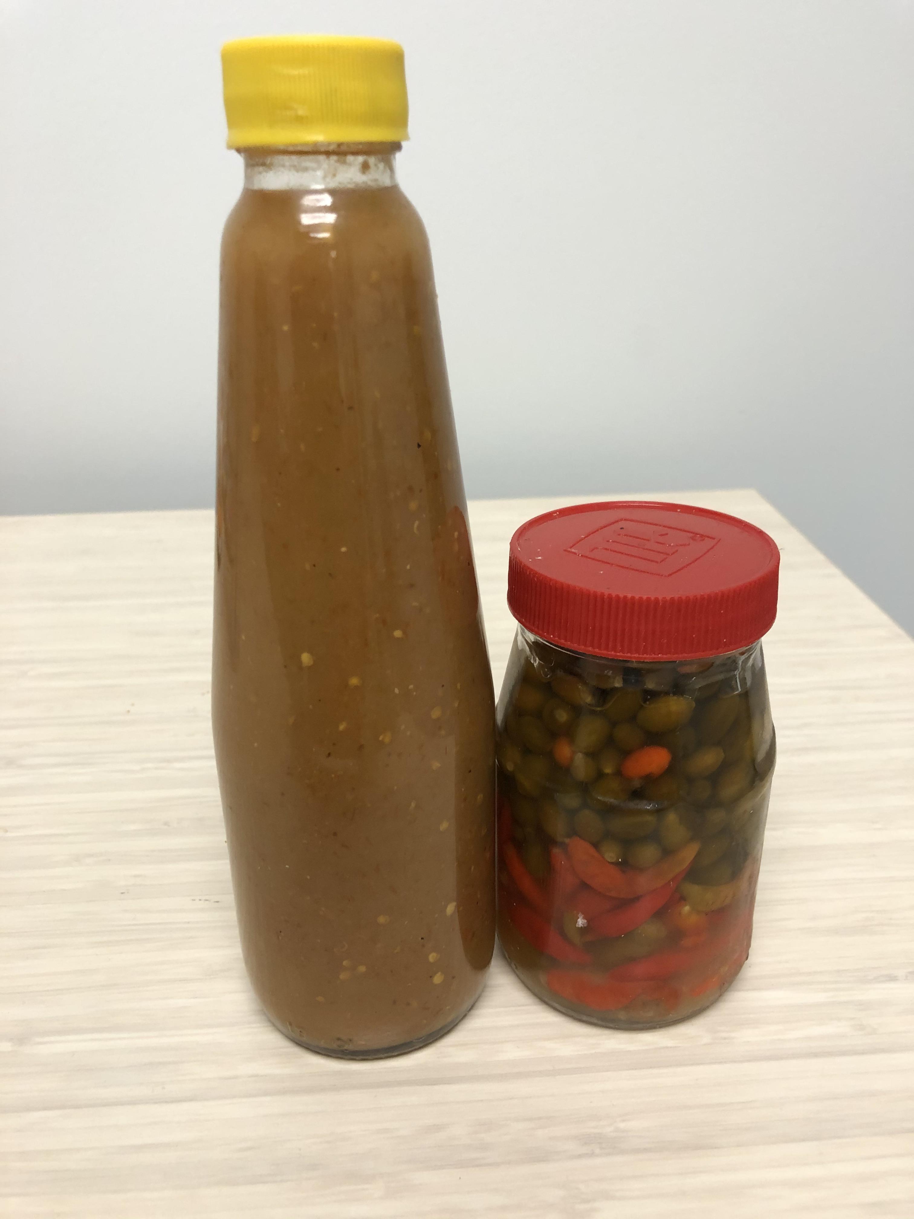 Habanero Sauce and Mystery Peppers in Vinegar from Mexico. r/hotsauce