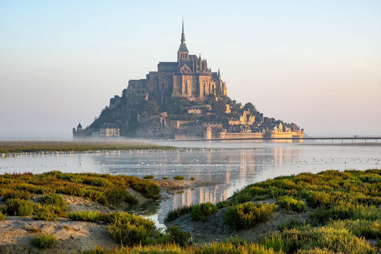 I think the Mont SaintMichel (built in 709) as a synchronization