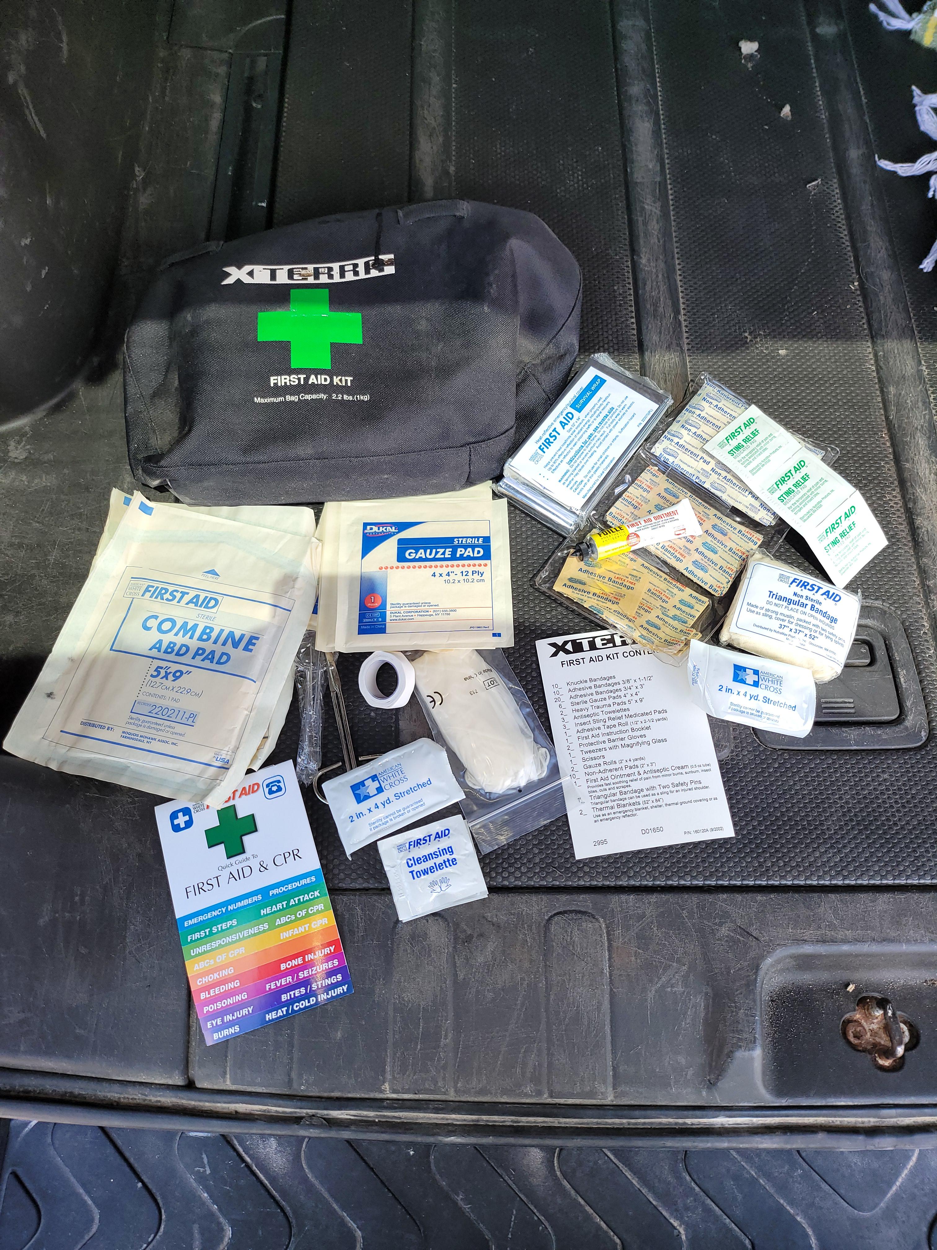 Bought an 06, came with the original First Aid Kit. Nothing missing or