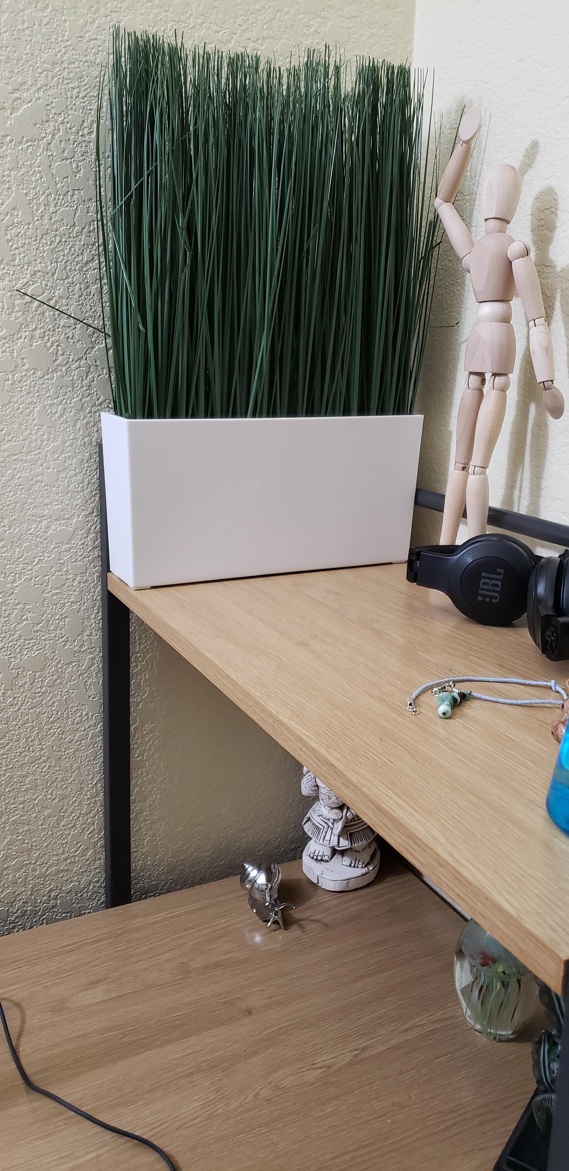 This fake plant that I got for my new desk fits perfectly r