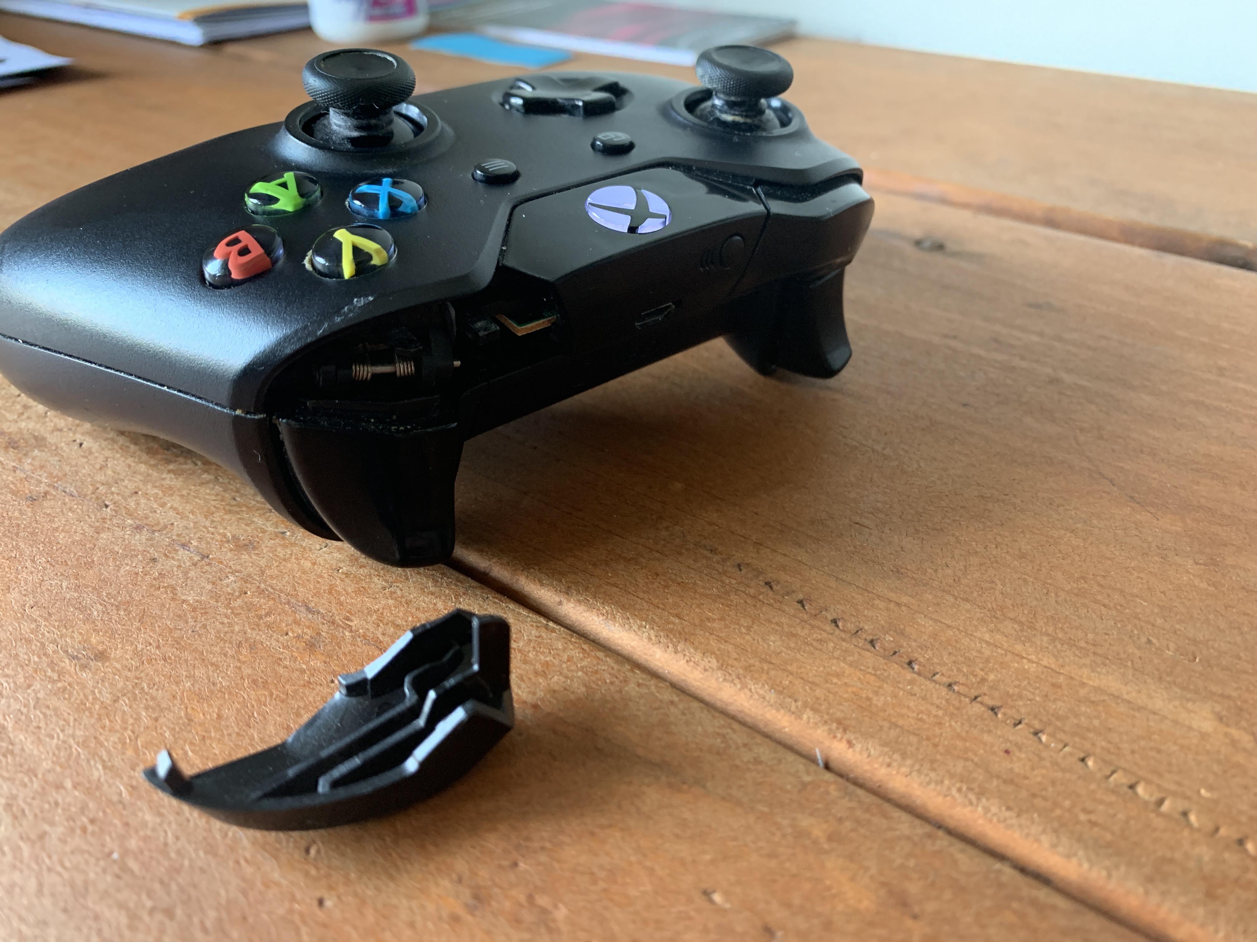 My right bumper broke off. Anyone know a way to secure it back on with