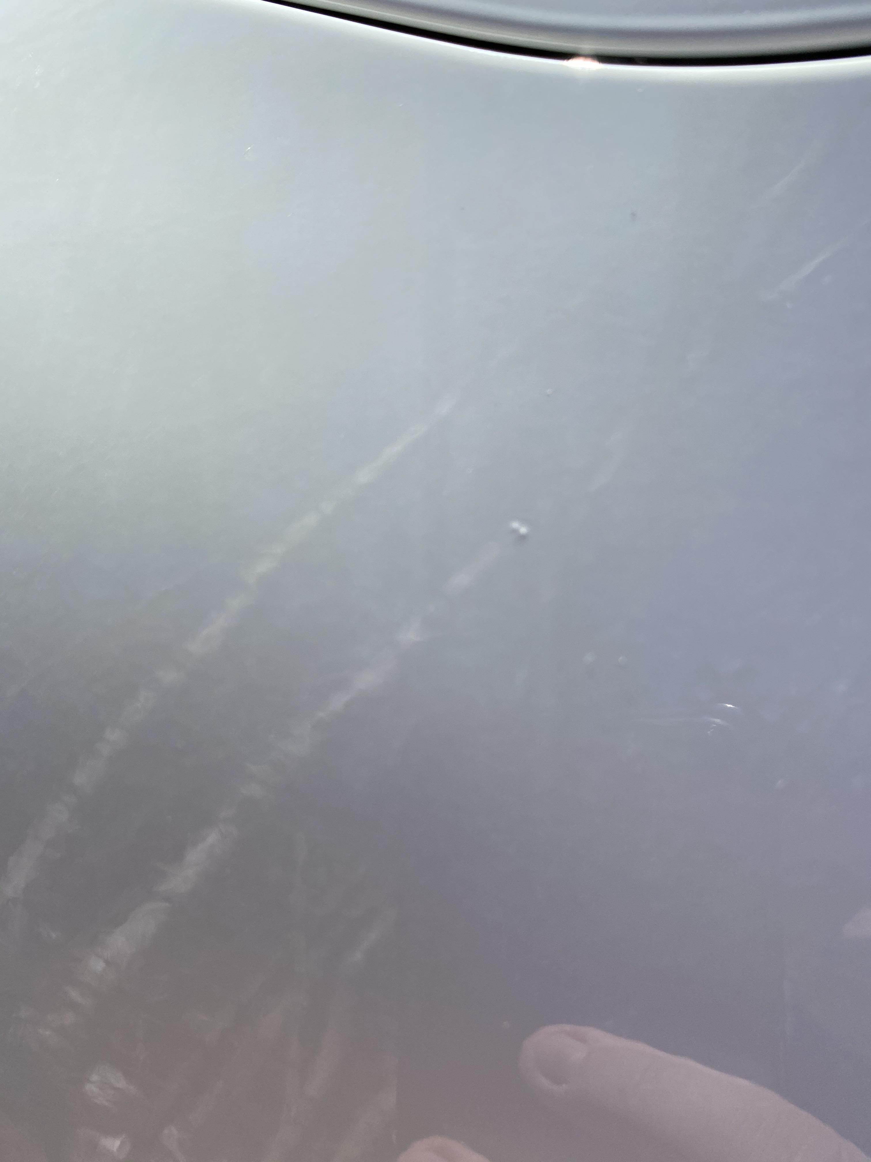 2 raised bumps on fender after paint job. Will these wet sand / polish