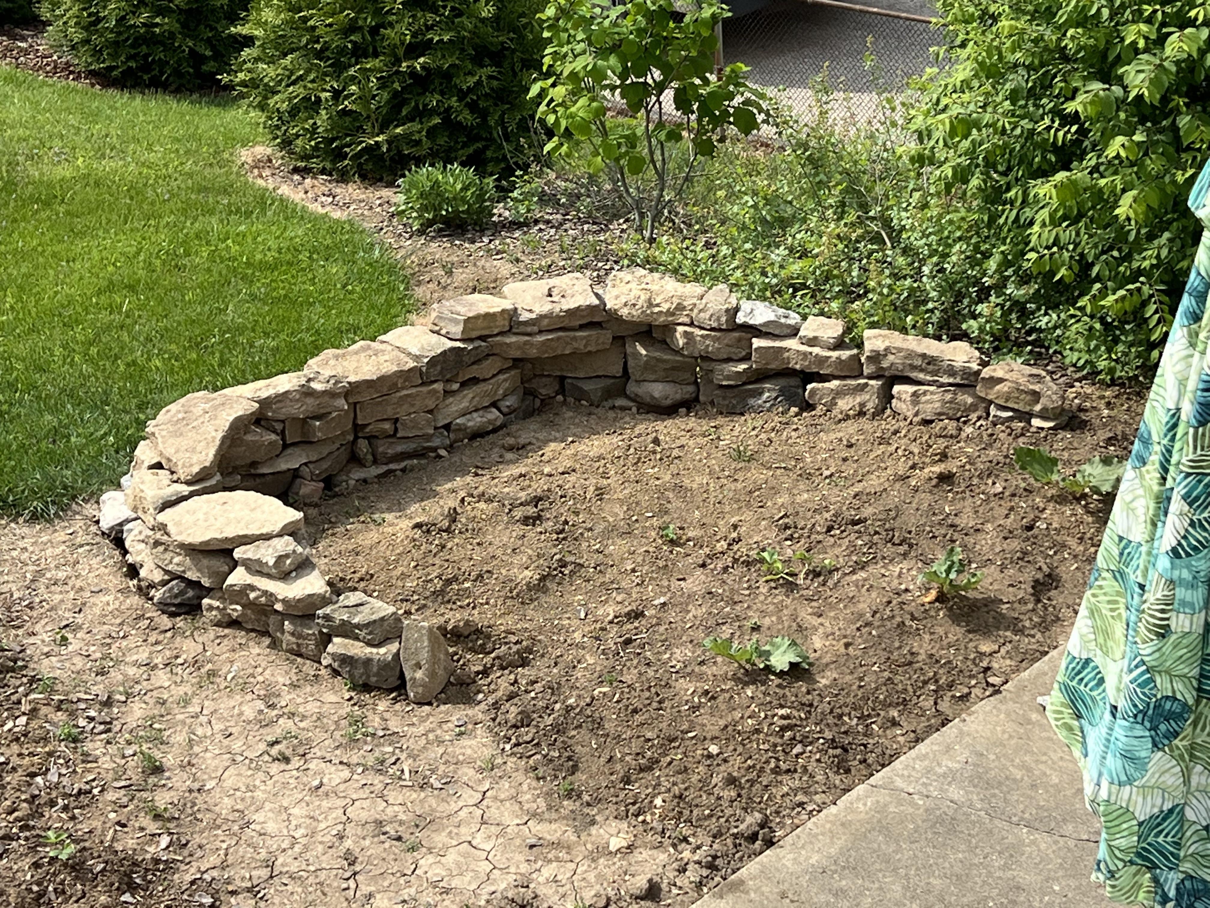 Finally finished building my little retaining wall for a herb garden