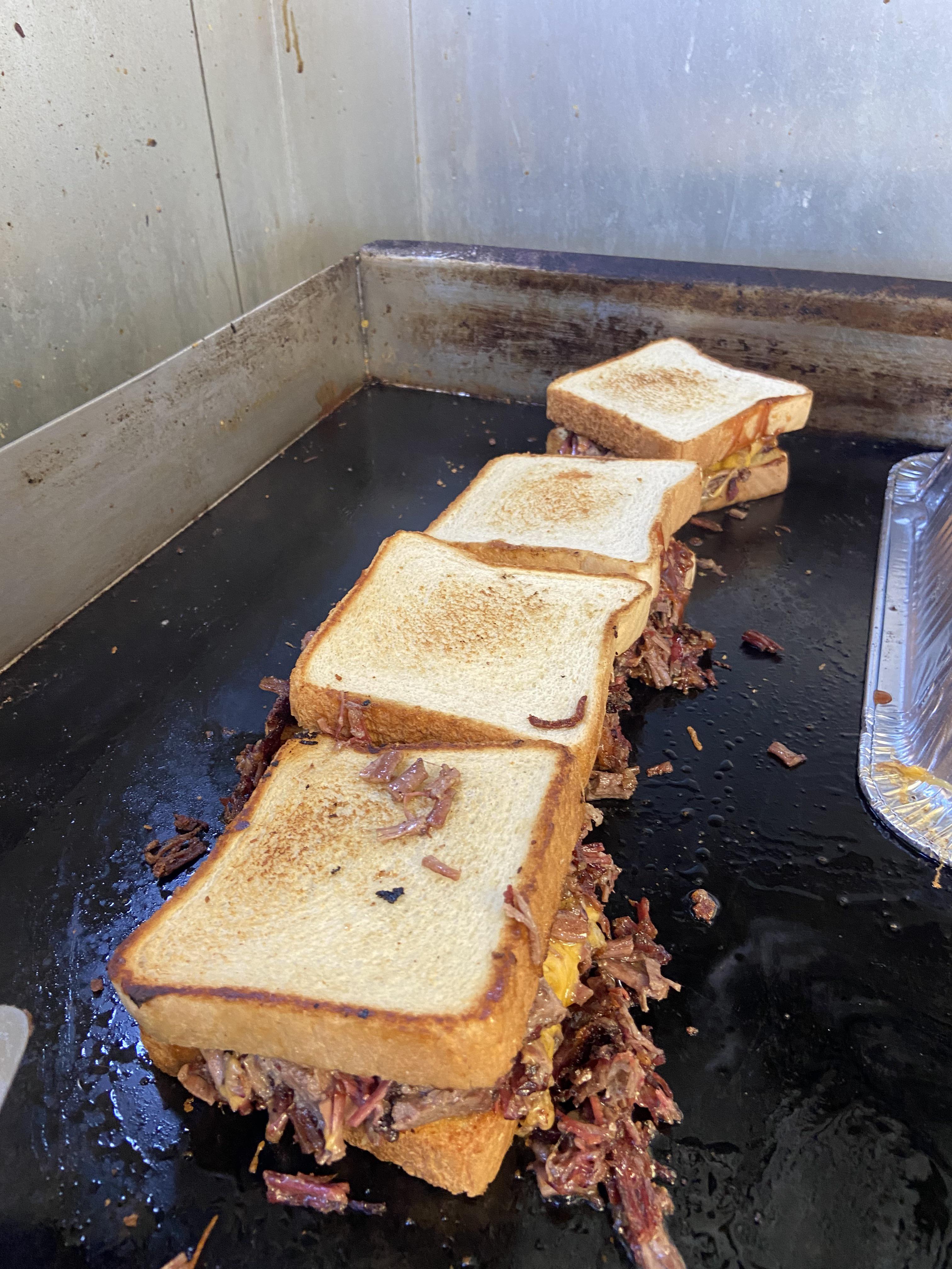 Slinging some brisket melts yesterday r/BBQ