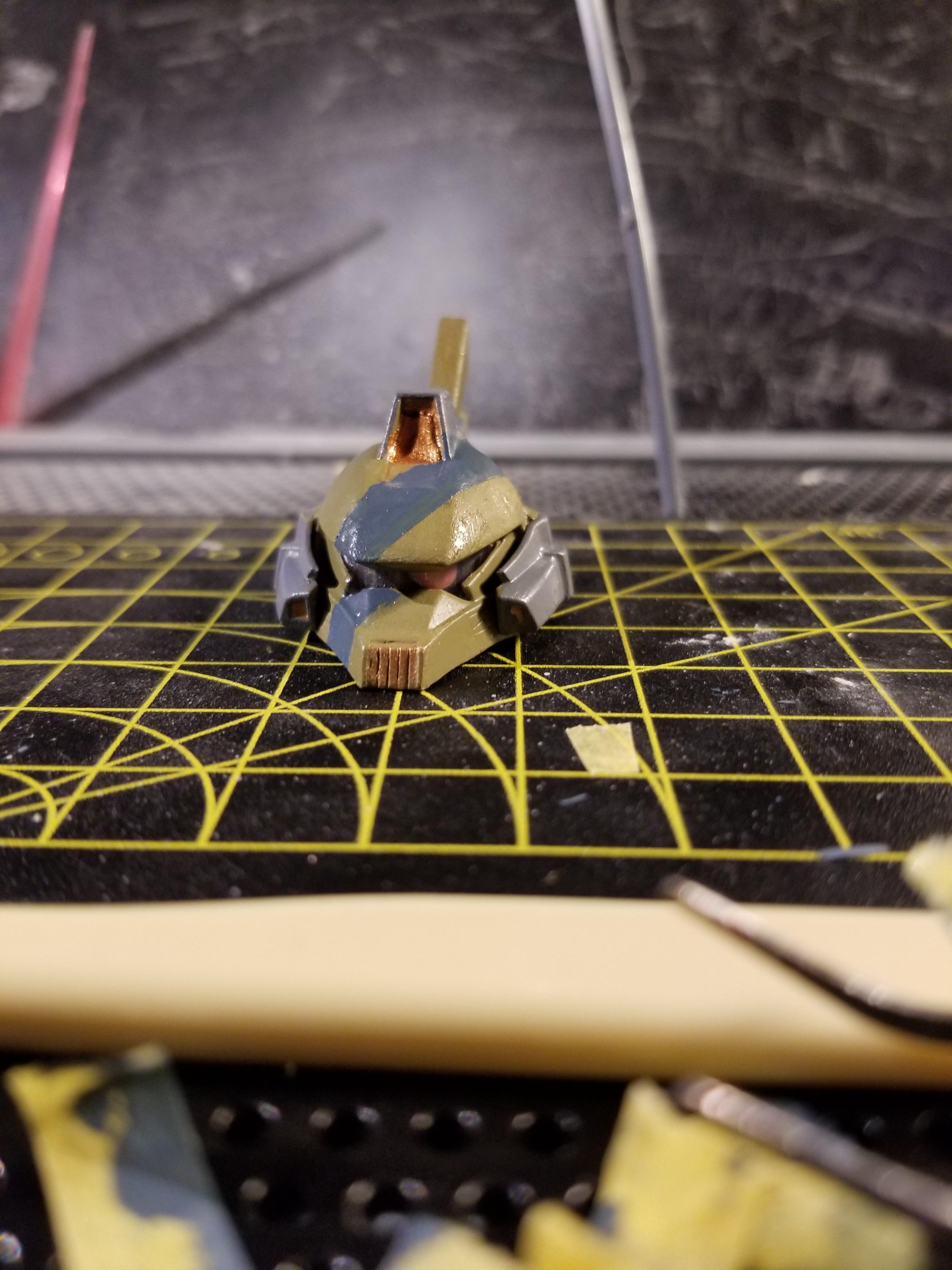 After painting/sanding/priming, here's my modified gelgoog cannon head. It needs some touchup