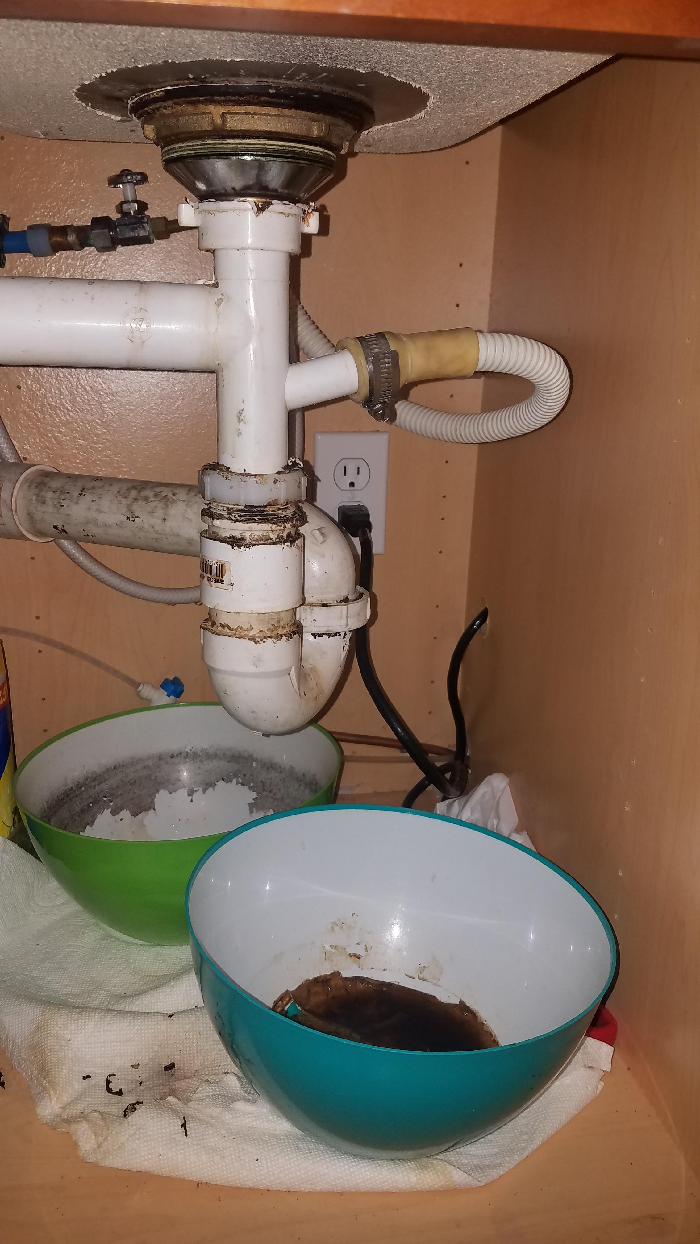 Kitchen sink has black discharge from piping. What is it? Is this a