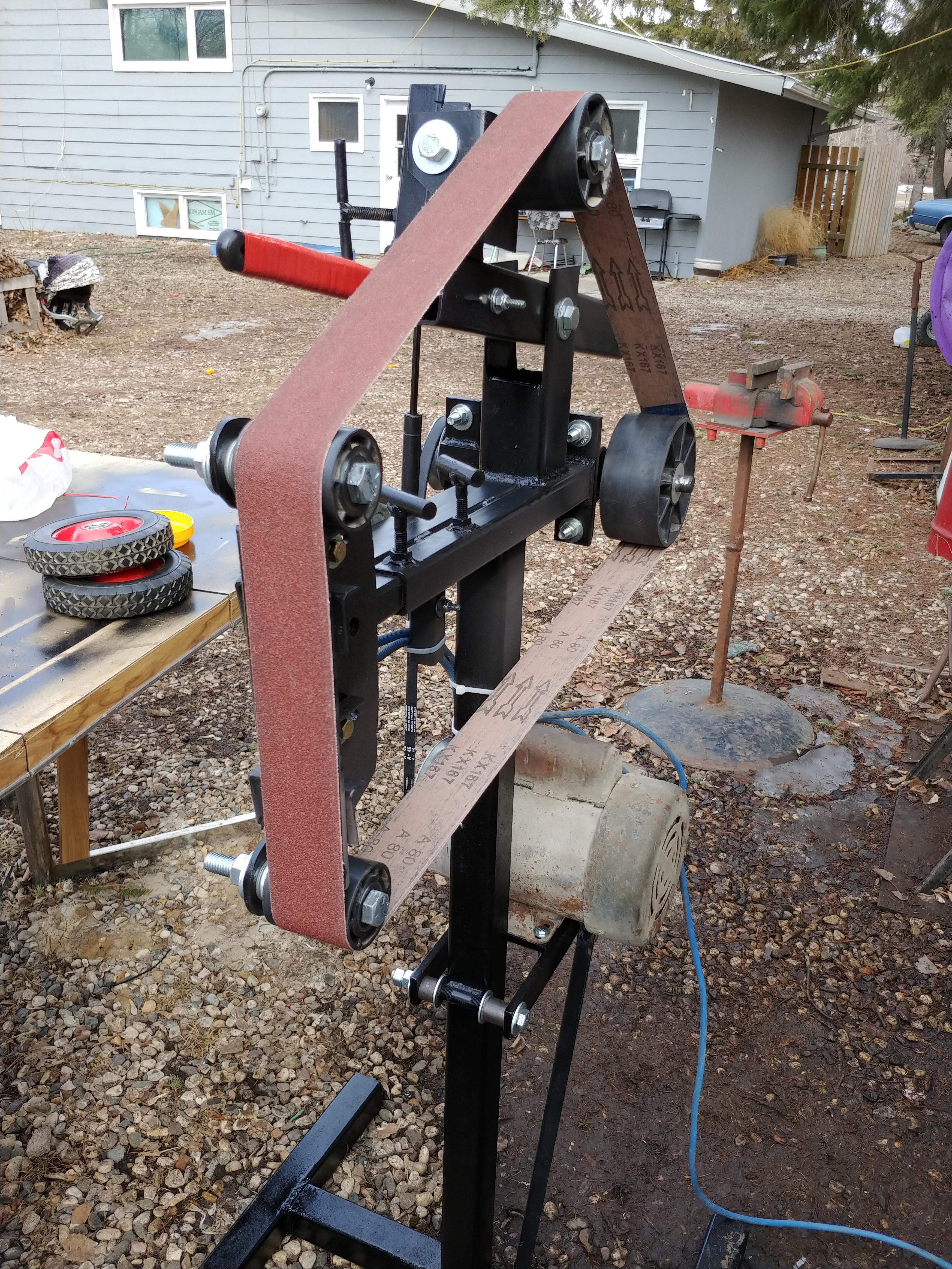 New custome made grinder. 2x72 3400 rpm. Interchangable front wheels