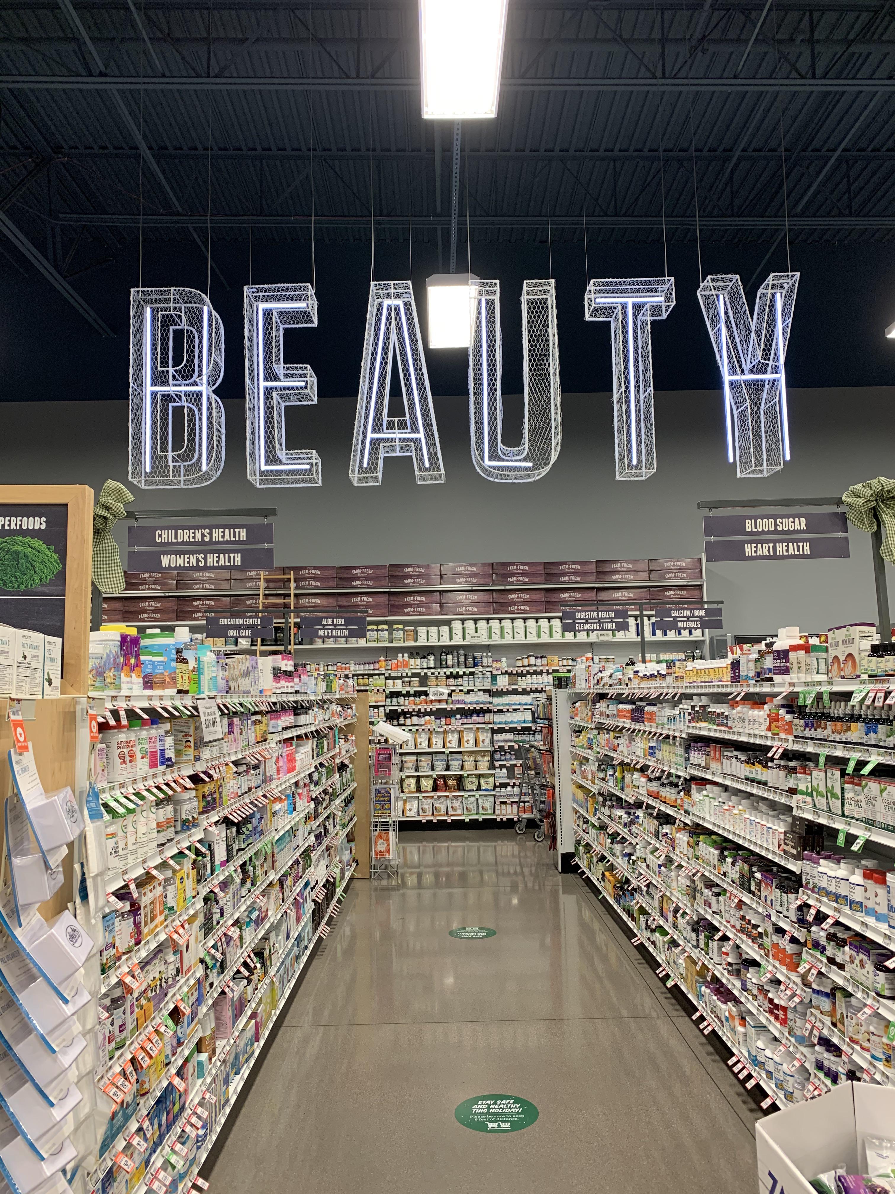 This sign at my local Sprouts that says “Beauty” and “Health” r