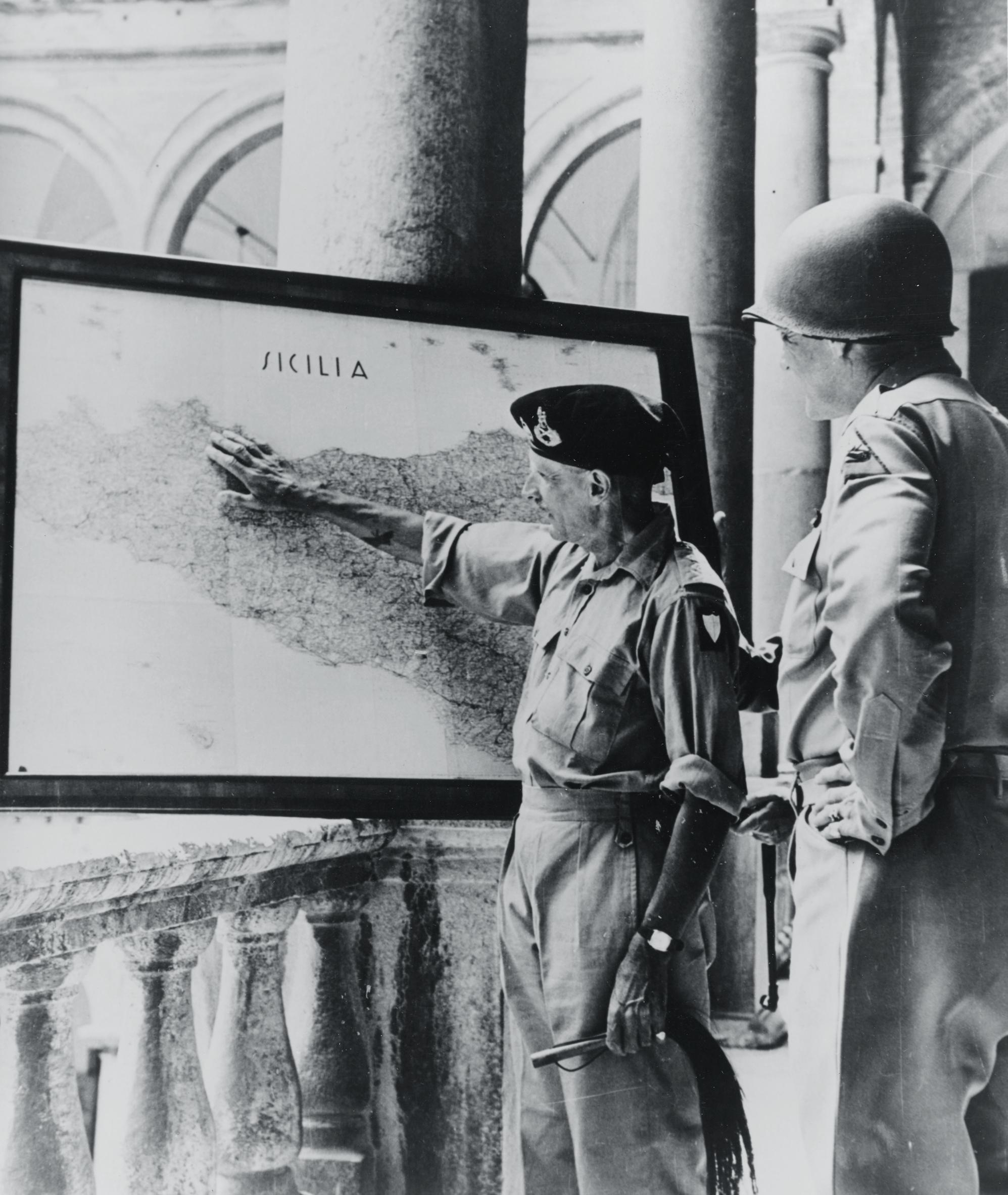 LtGen Montgomery and LtGen General S. Patton Jr. look over a map