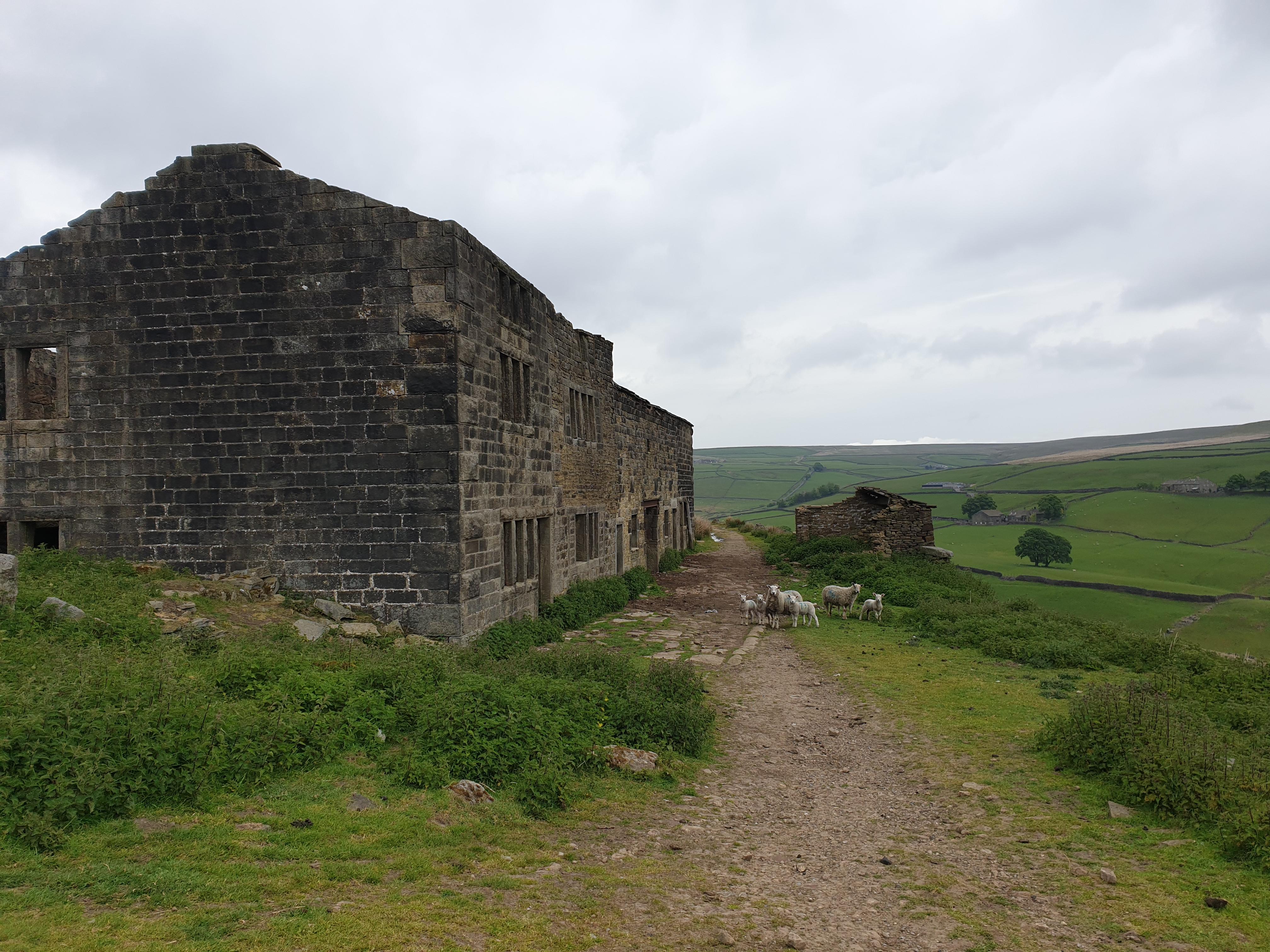 Derelict farm above Hebden Bridge, Yorkshire. The track is the old road