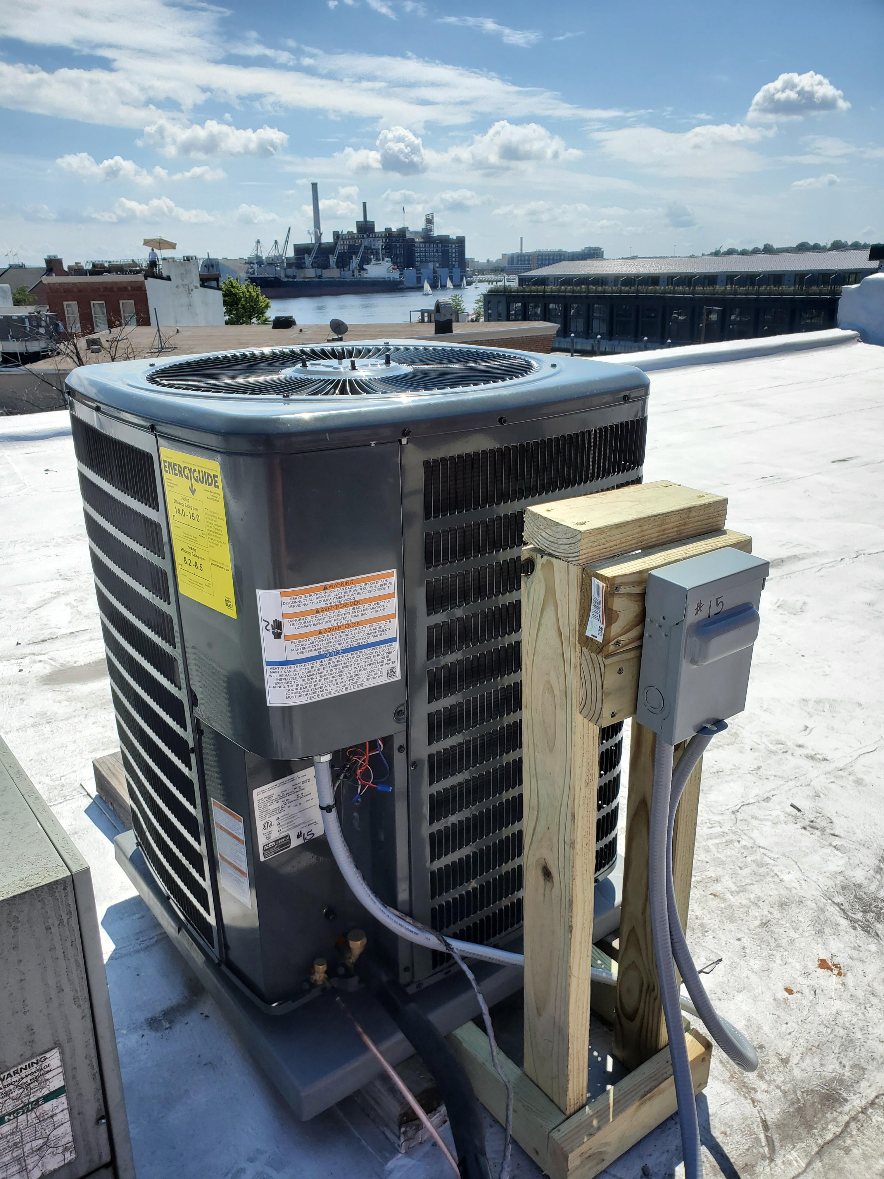 Rooftop install with handmade disconnect post. r/HVAC
