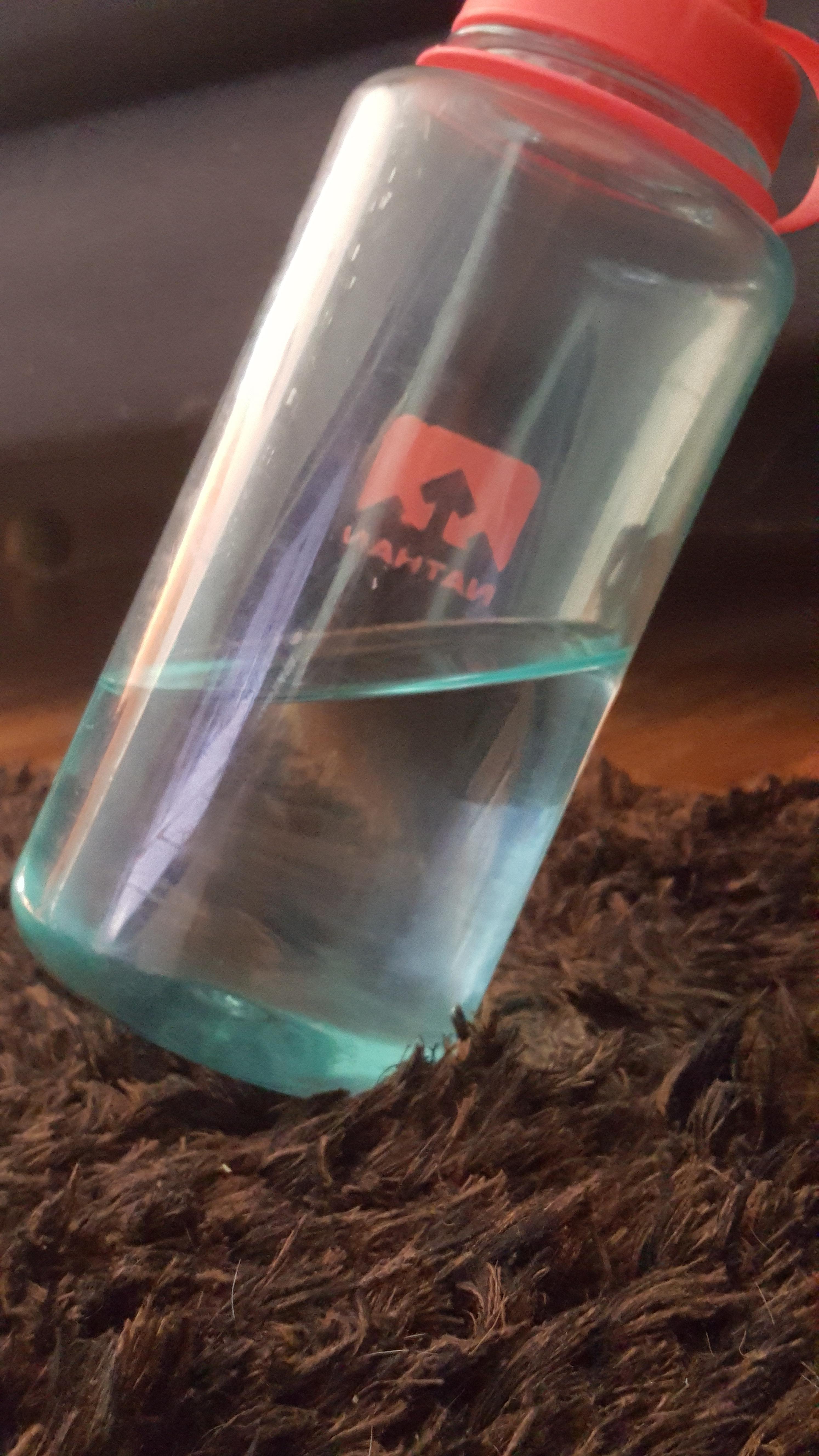 I was able to balance a halffull water bottle on one side. r