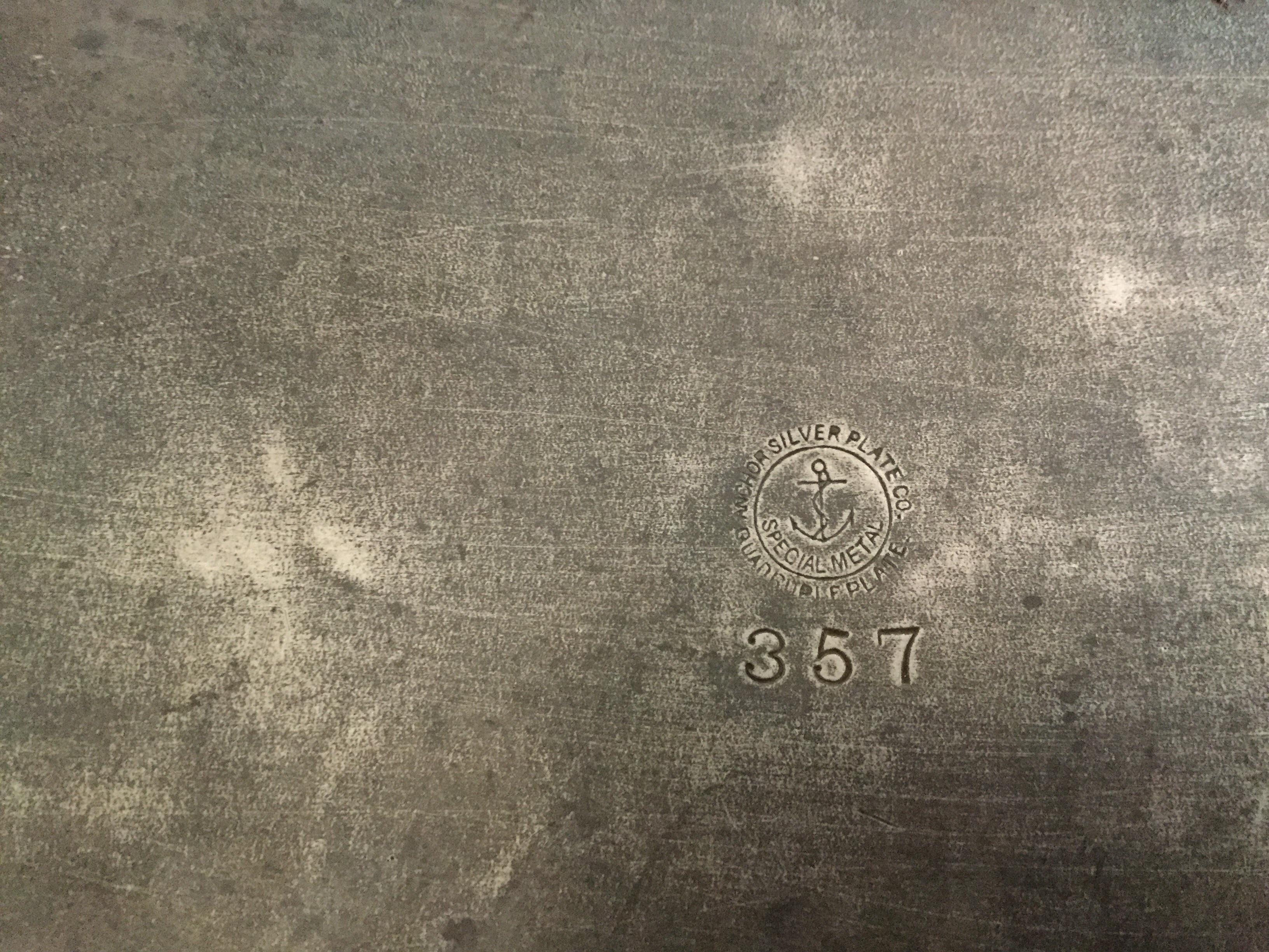 It's the back of a silver platter. Anyone know what it might be worth