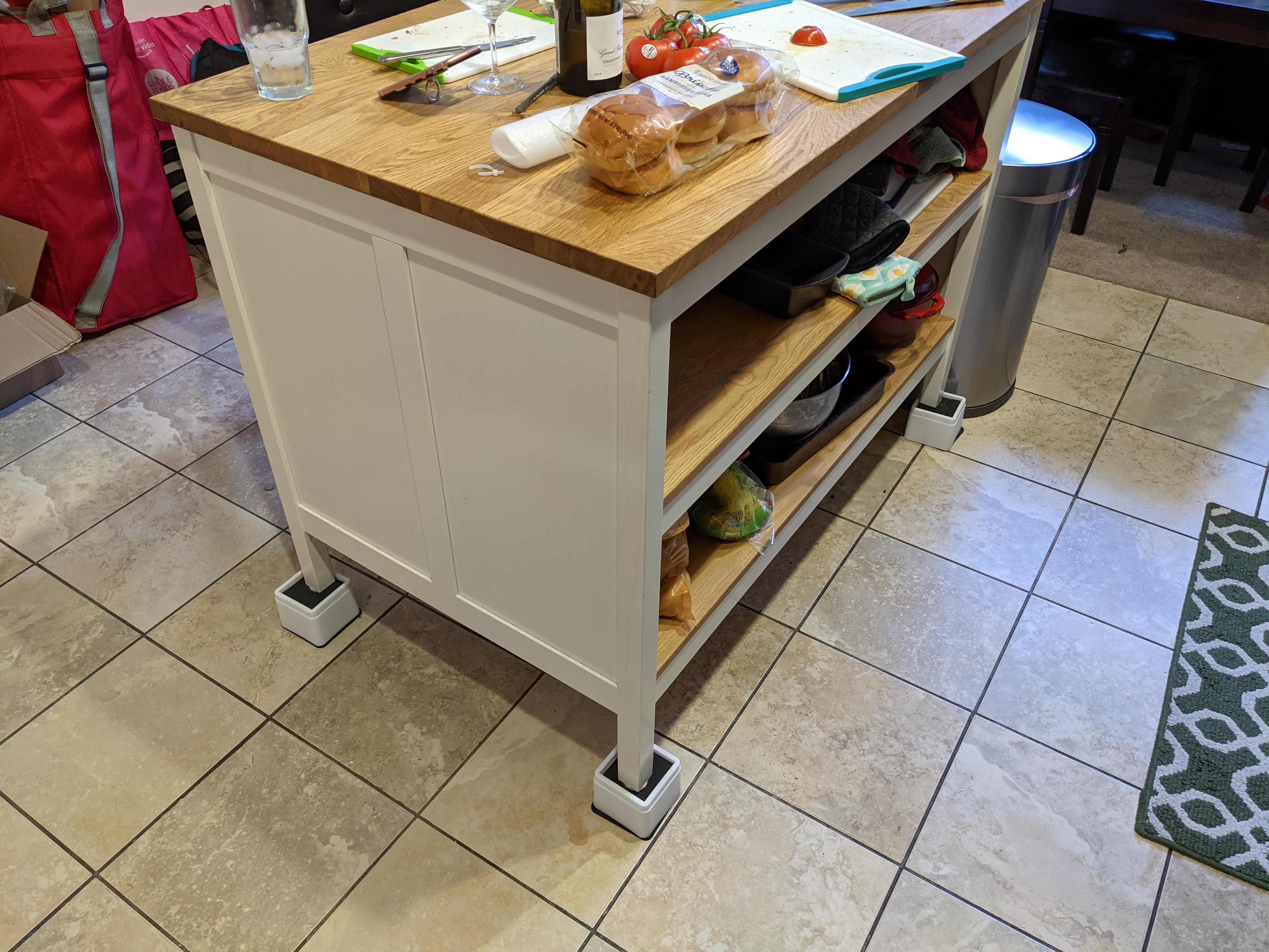 Ikea kitchen island + furniture risers = no more back pain r/tall