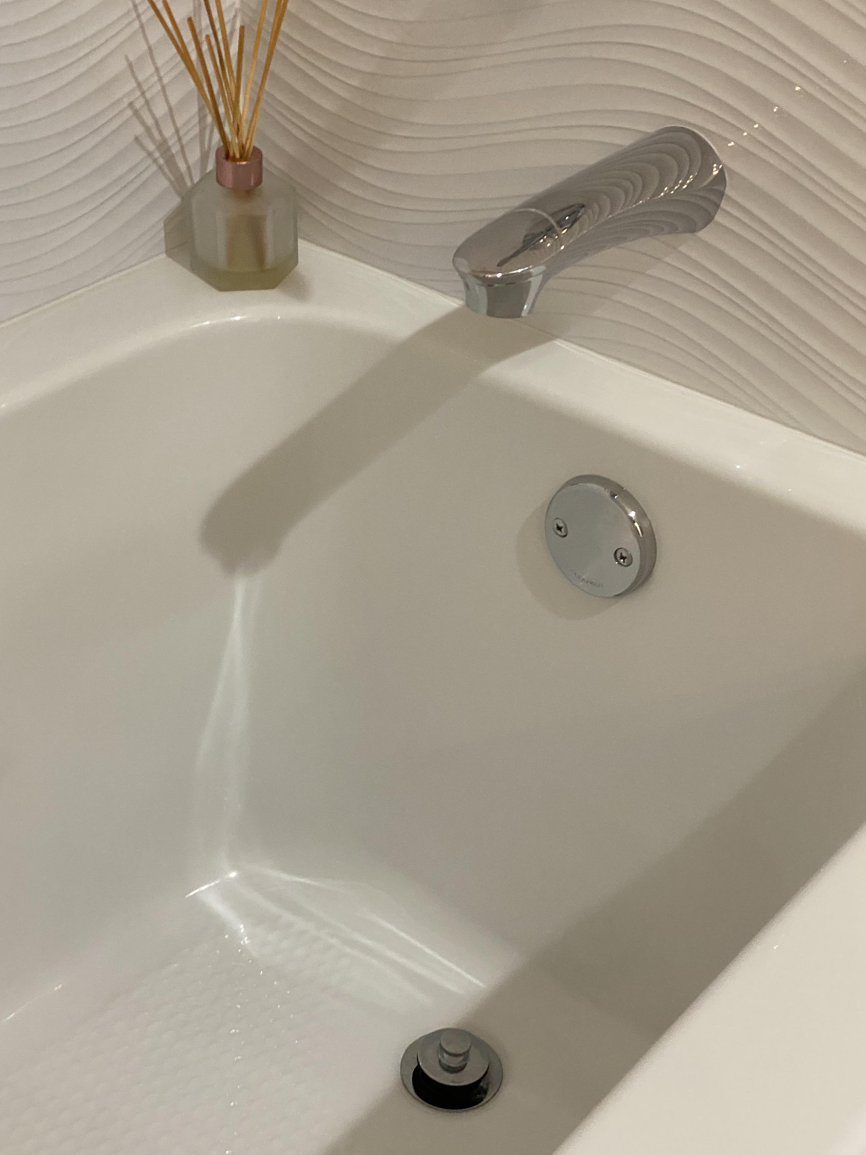 The reflection in my tub looks like water is coming out of the faucet