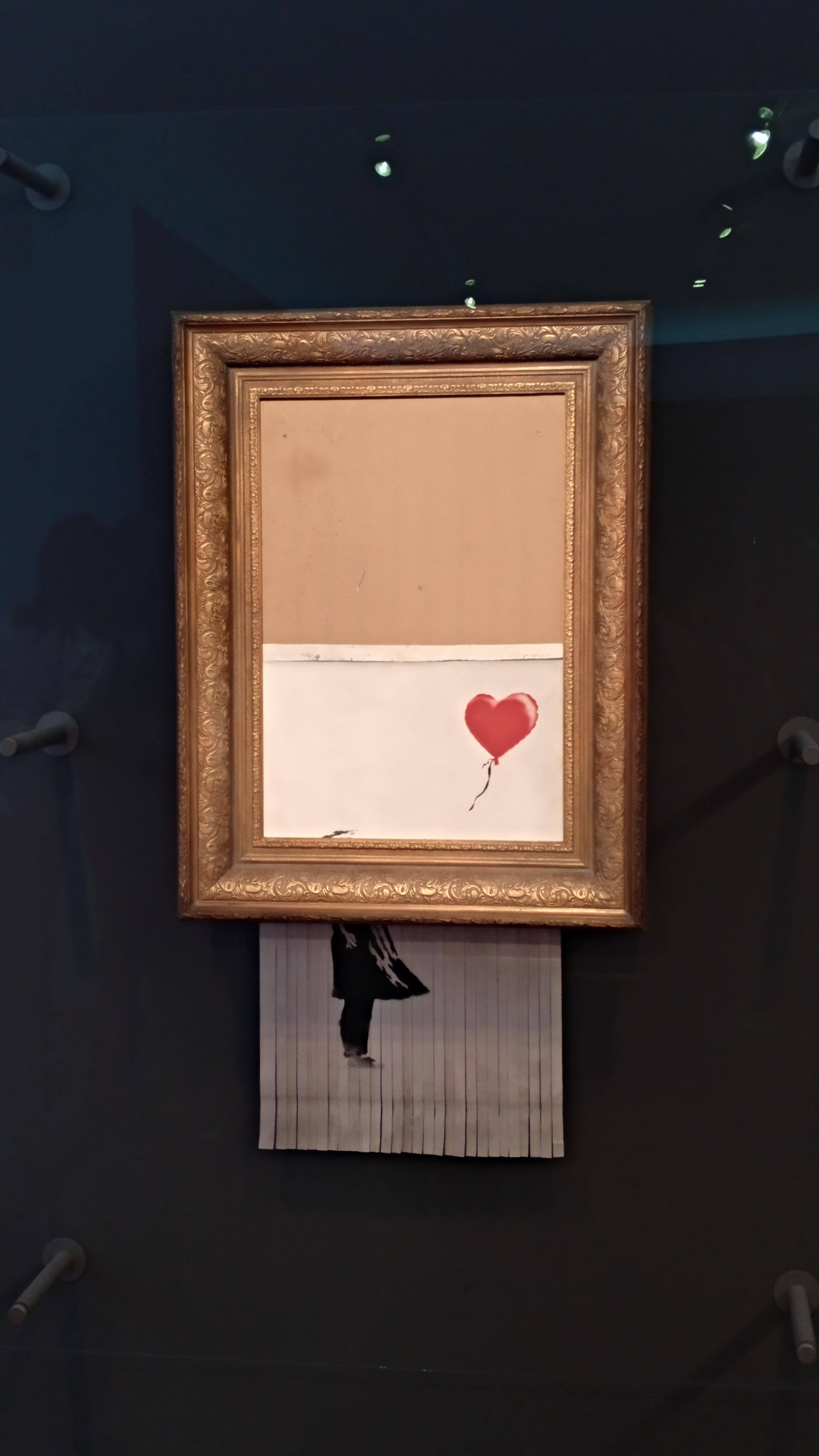 I went to see the shredded Girl with a Balloon today. it was free which