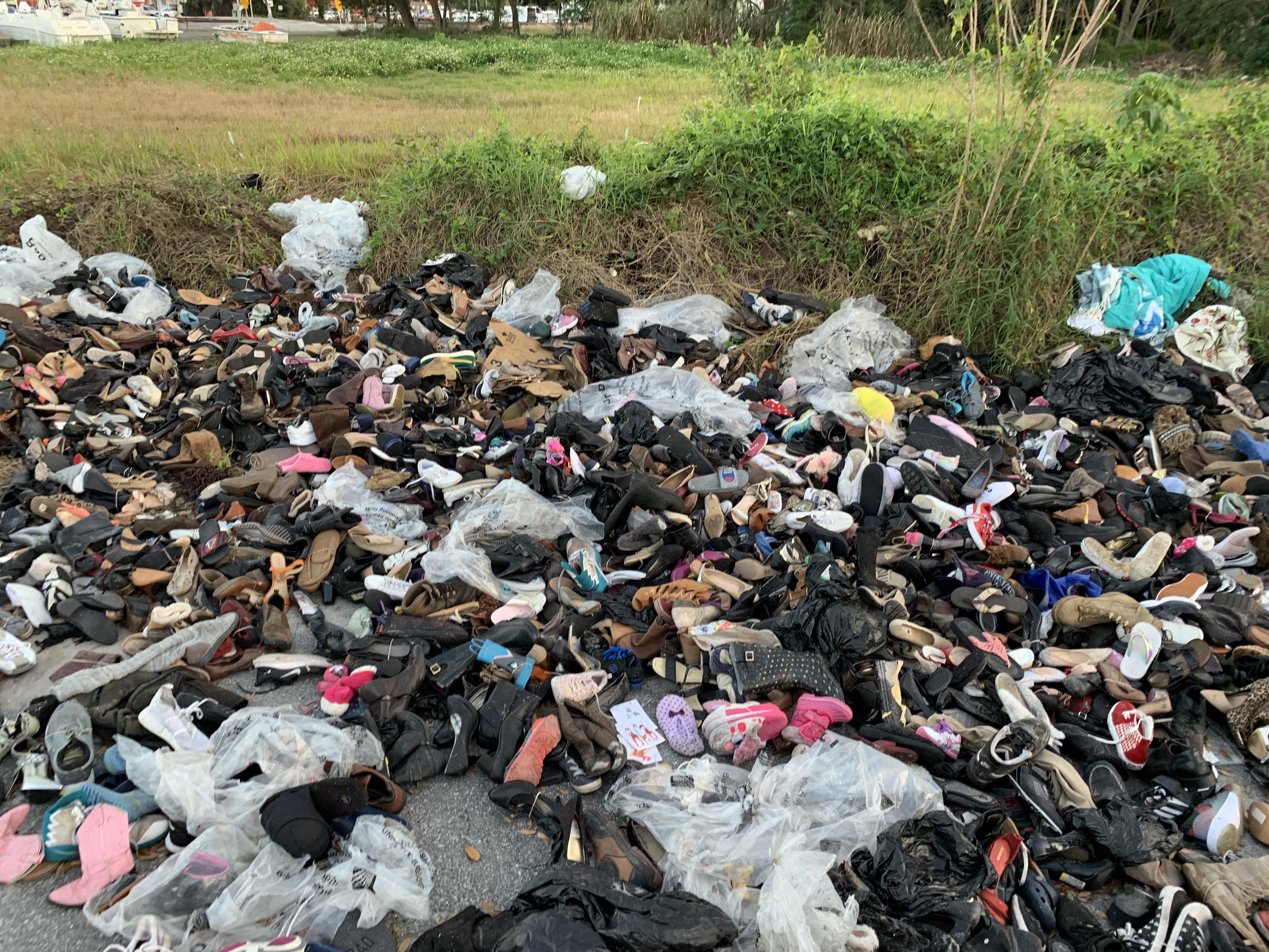 Shoe Dump. A bunch of shoes dumped by my work. A lot of them have